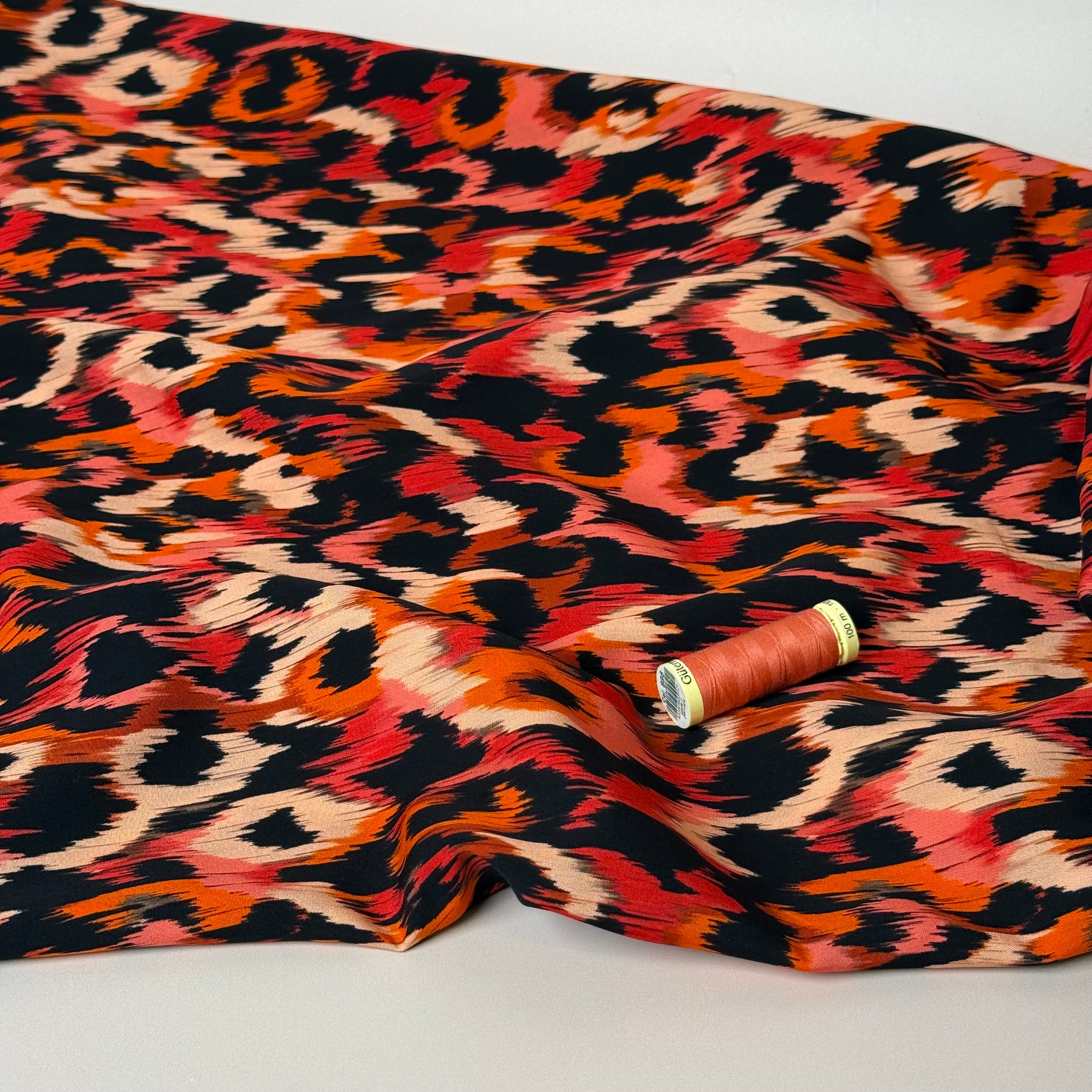 Abstract Animal Orange Viscose Poplin Fabric