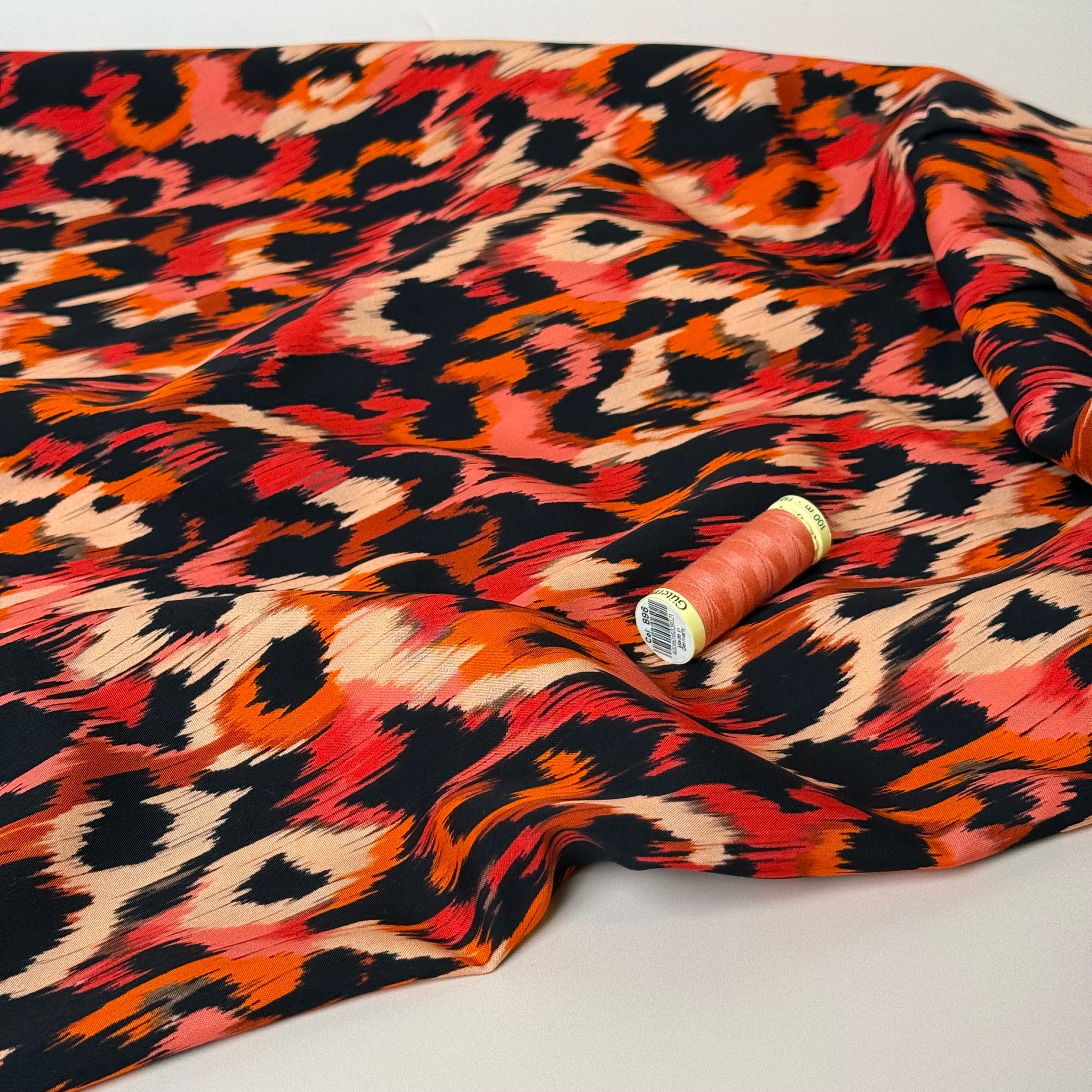 Abstract Animal Orange Viscose Poplin Fabric