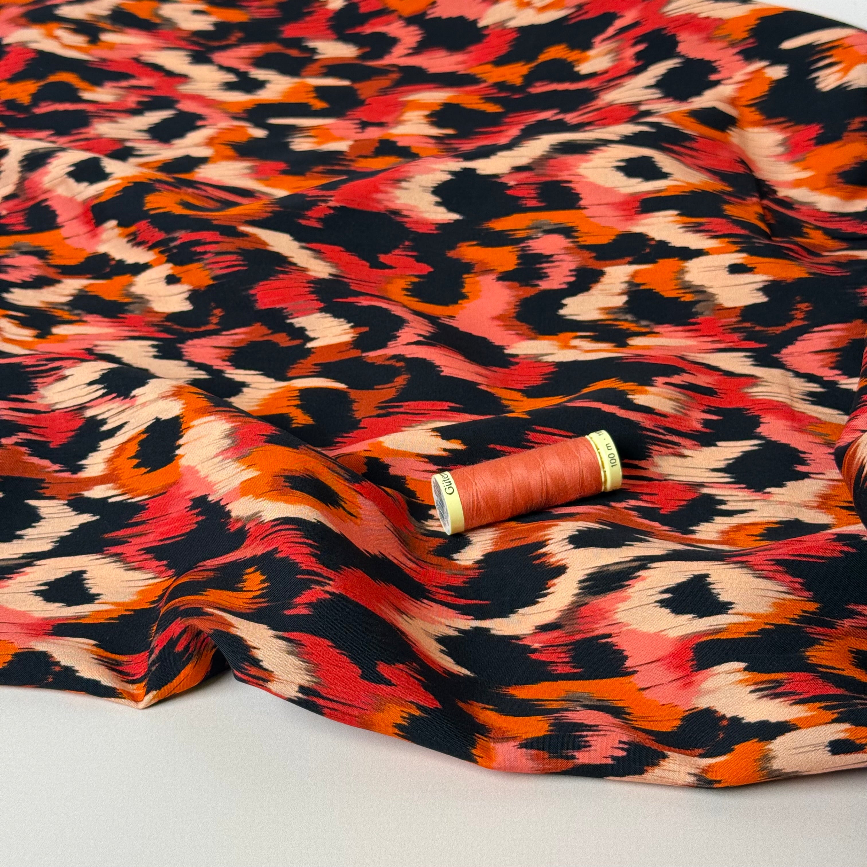 Abstract Animal Orange Viscose Poplin Fabric