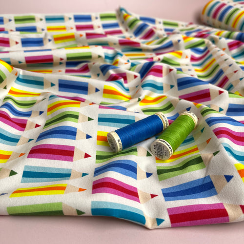 Rainbow Pencils on White Cotton Jersey Fabric