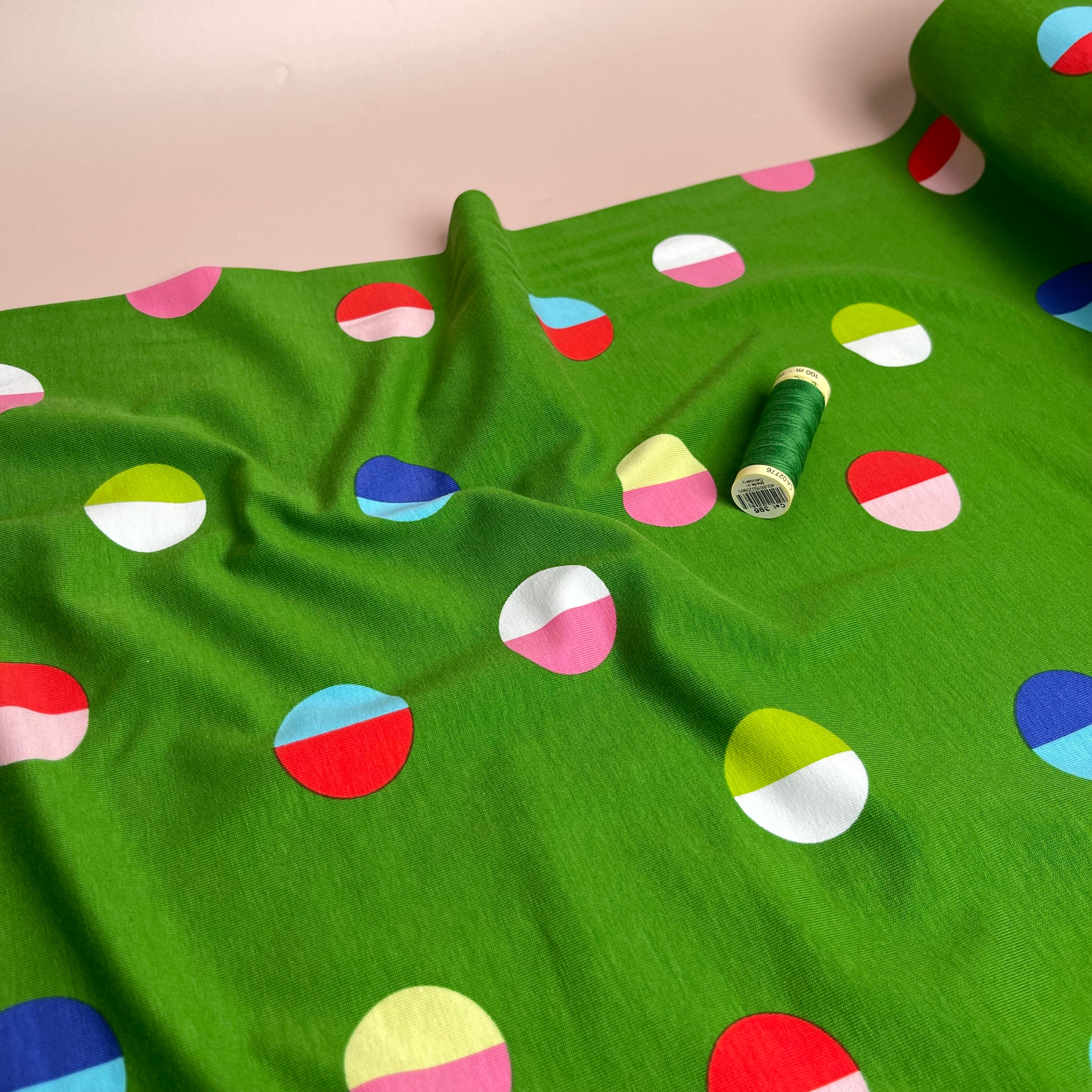 Split Circles on Green Cotton Jersey Fabric