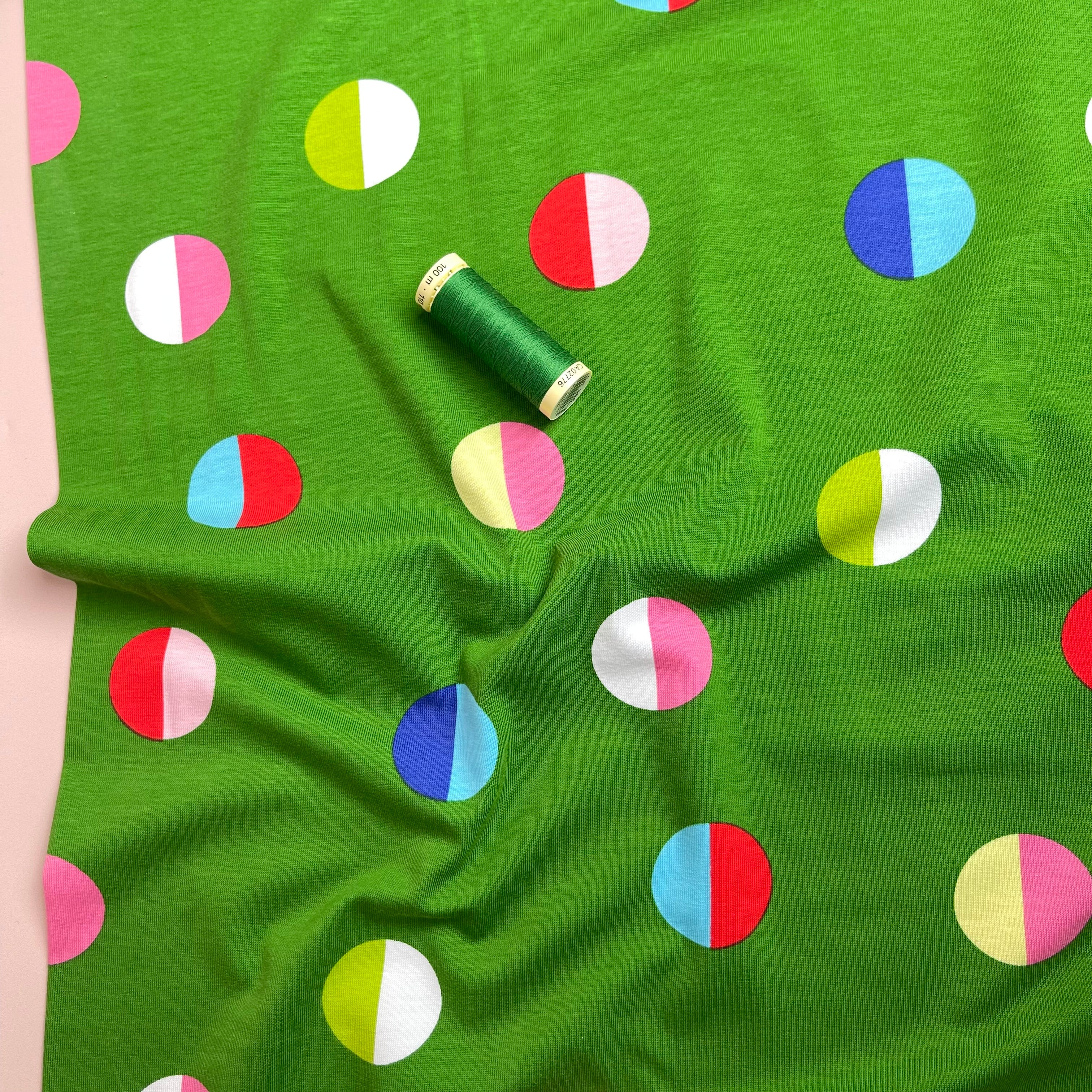 Split Circles on Green Cotton Jersey Fabric