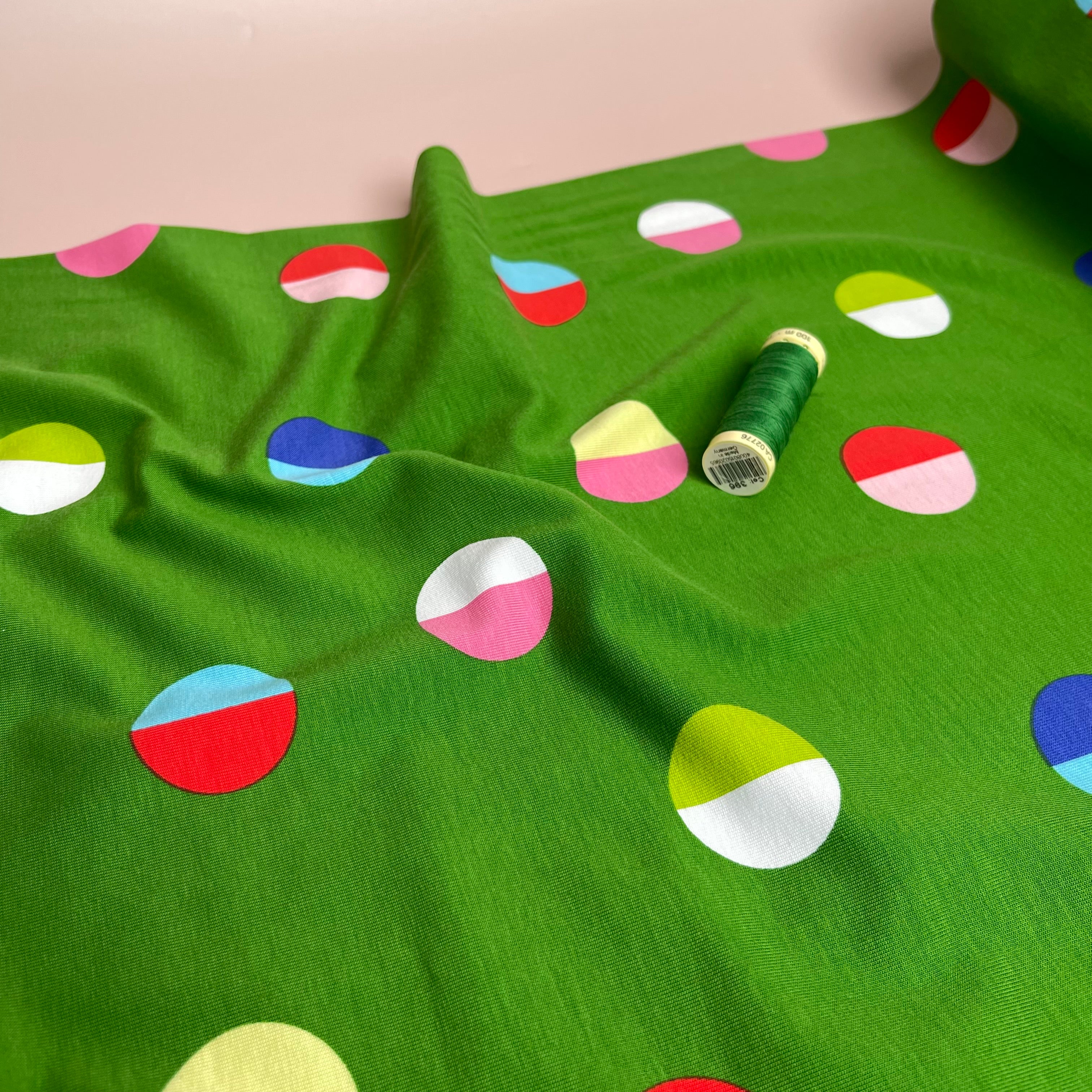 Split Circles on Green Cotton Jersey Fabric