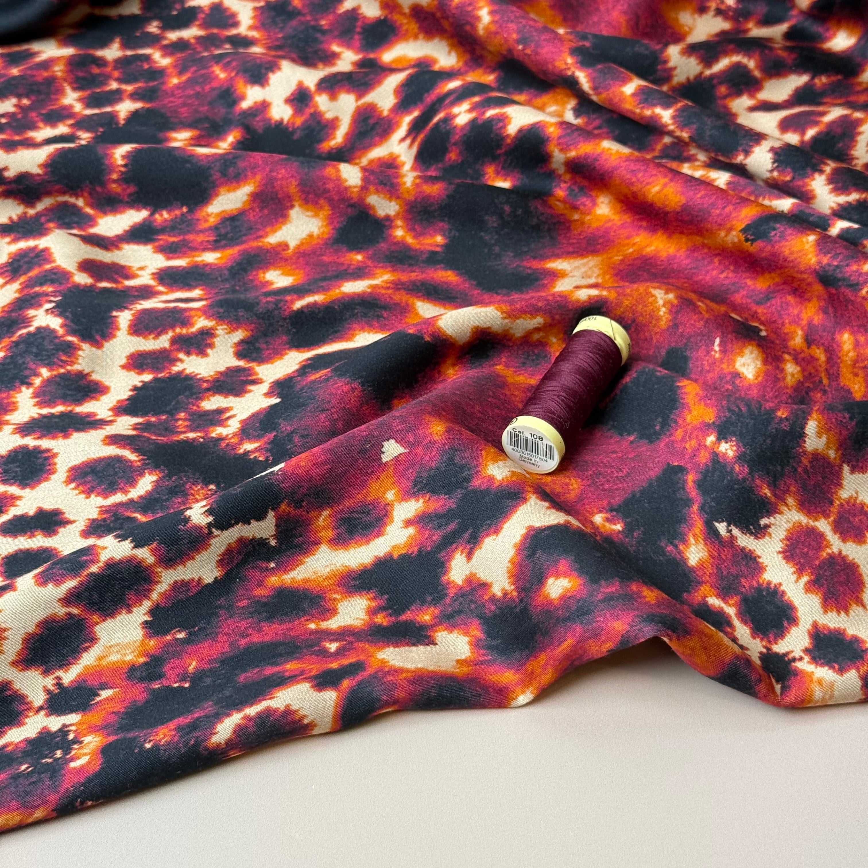 REMNANT 2.08 Metres - Bordeaux Animal Print Viscose Sateen Fabric