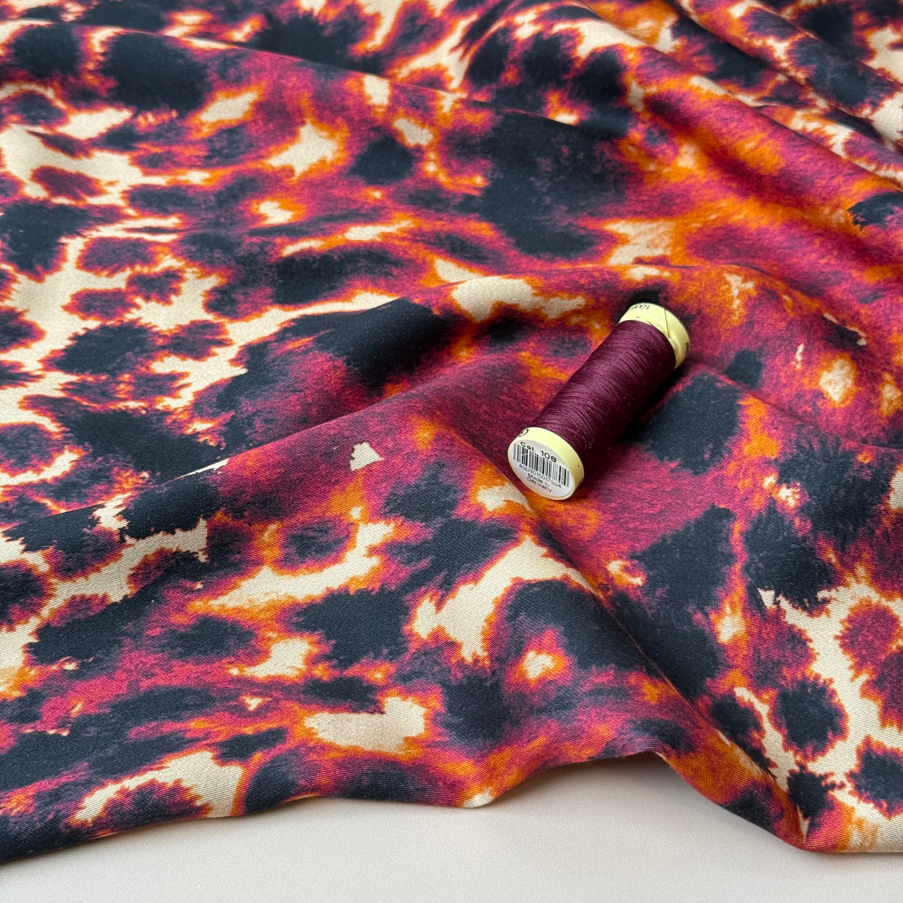 REMNANT 2.08 Metres - Bordeaux Animal Print Viscose Sateen Fabric