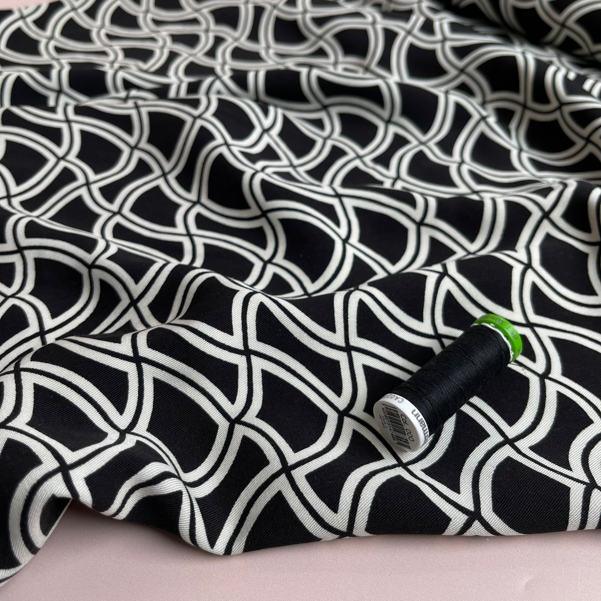 Abstract Waves on Black Viscose Twill Fabric