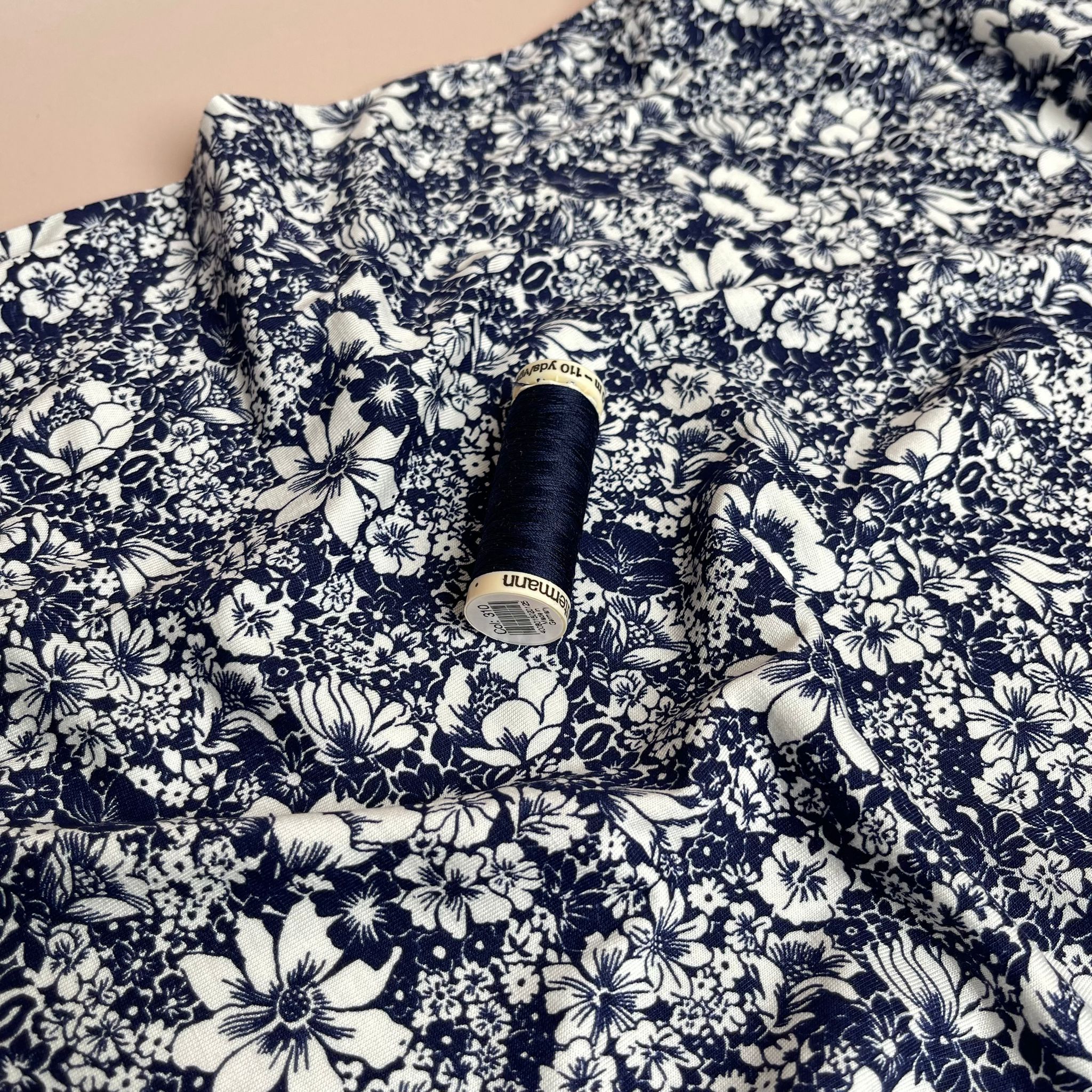 White Flowers on Navy Viscose Jersey Fabric