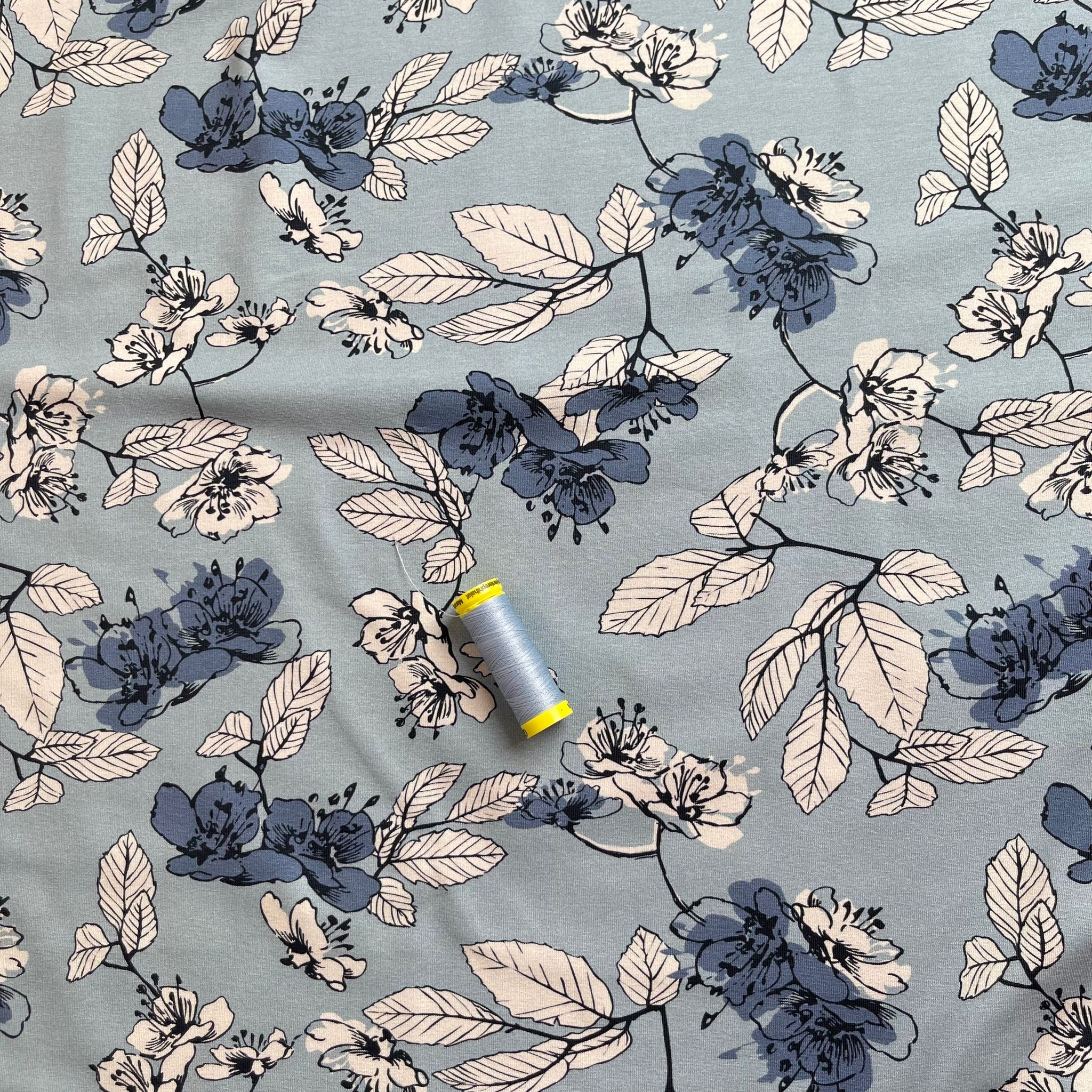 Danish Design - Elegant Florals on Pale Blue Cotton Jersey Fabric