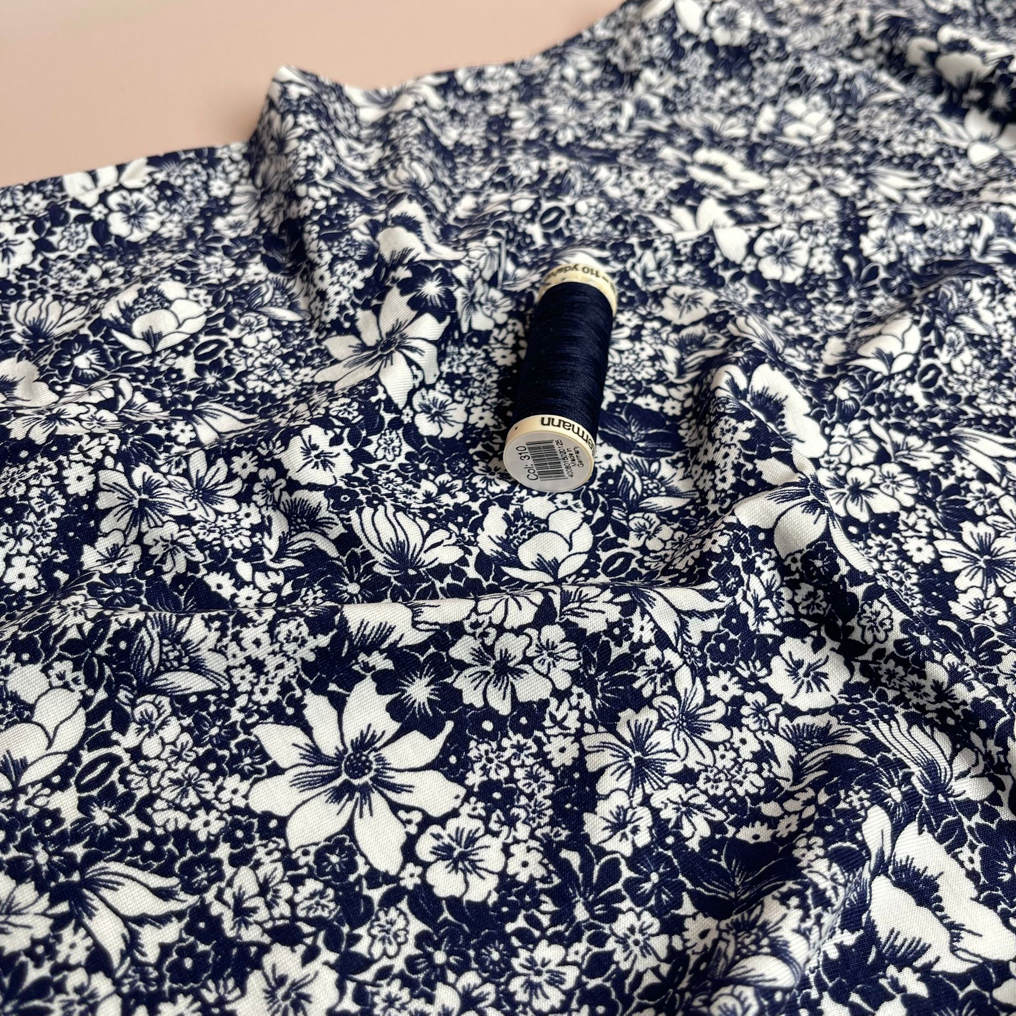 White Flowers on Navy Viscose Jersey Fabric