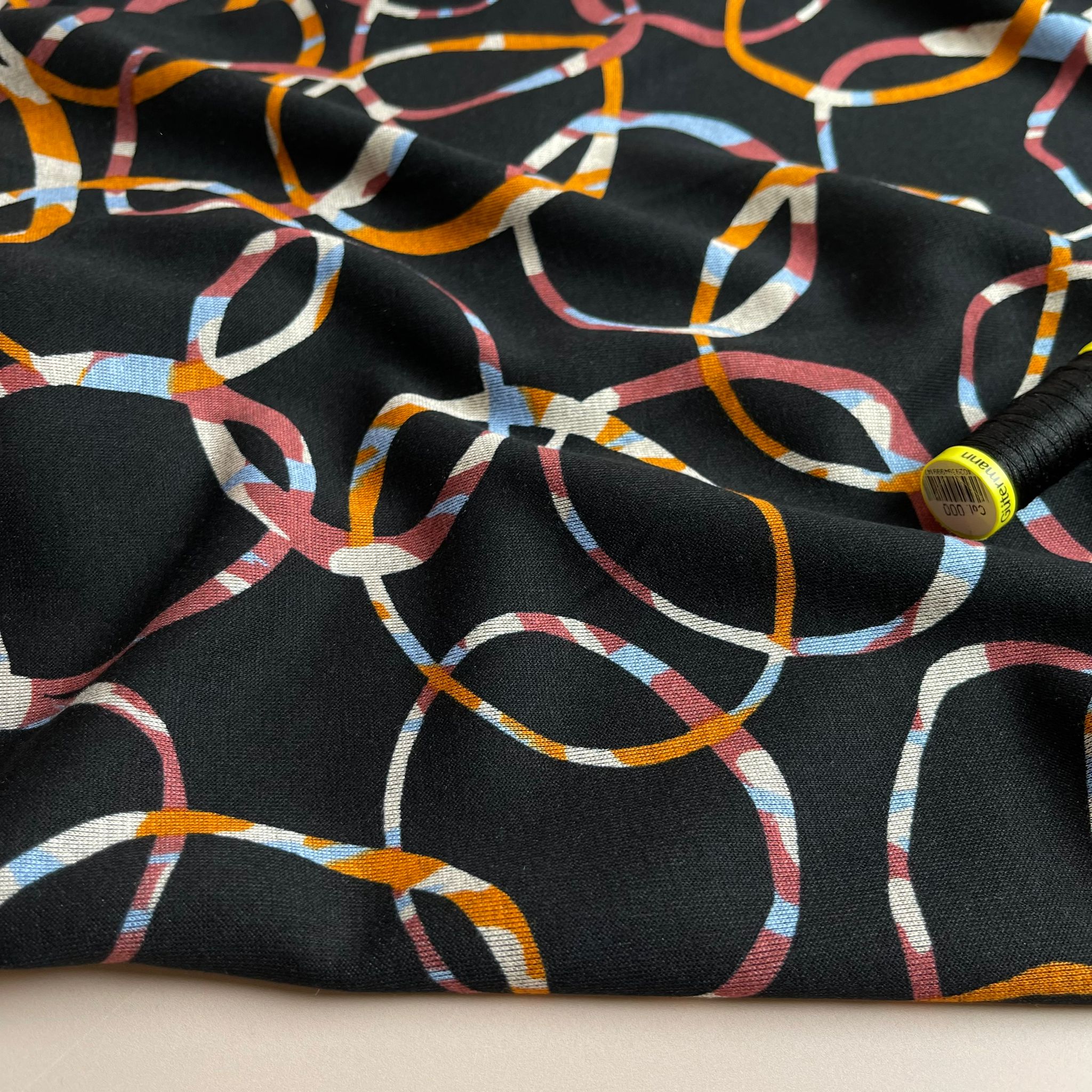 Sunset Loops Soft Ponte Interlock Jersey Fabric