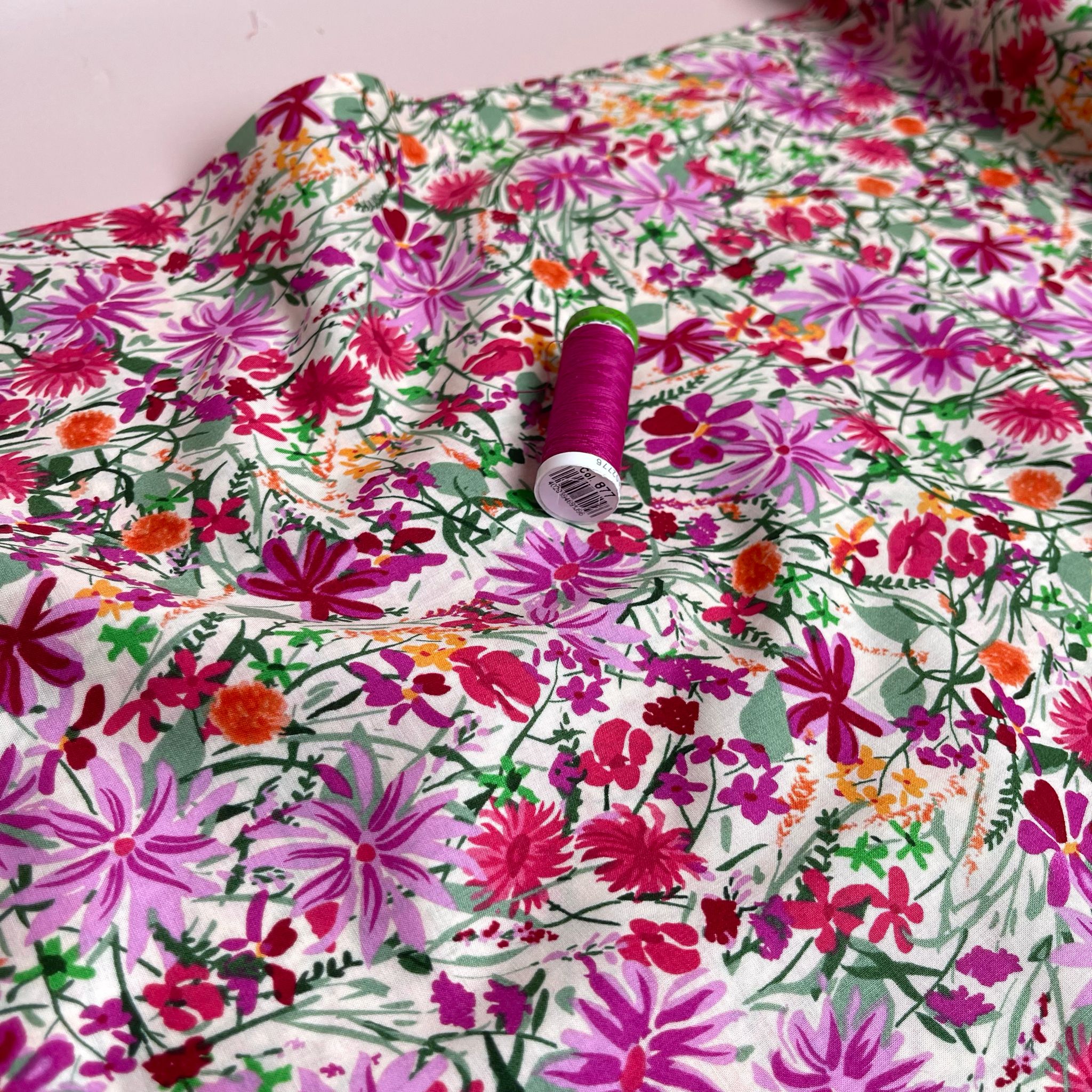 Magenta Meadow on White Cotton Lawn Fabric