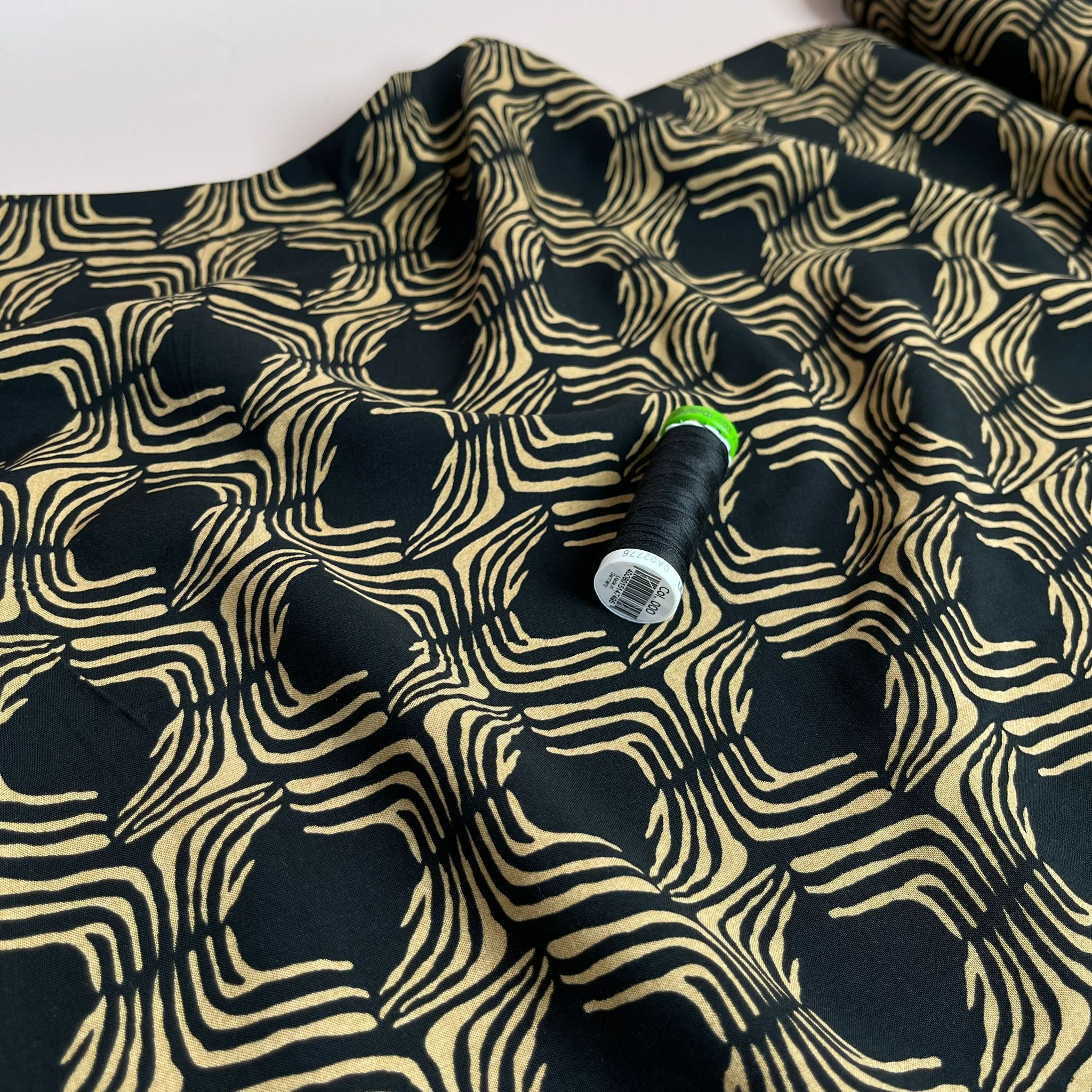 REMNANT 1.46 Metres - Abstract Lines in Gold on Black Viscose Poplin Fabric