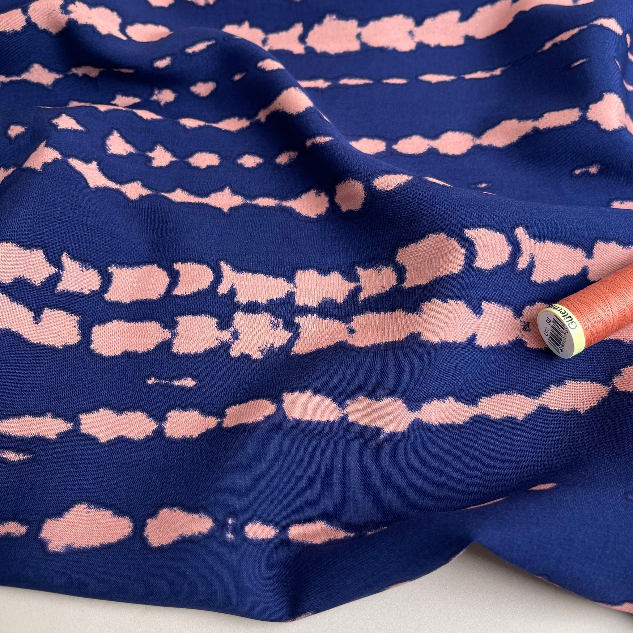 Broken Lines in Peach on Navy Viscose Fabric