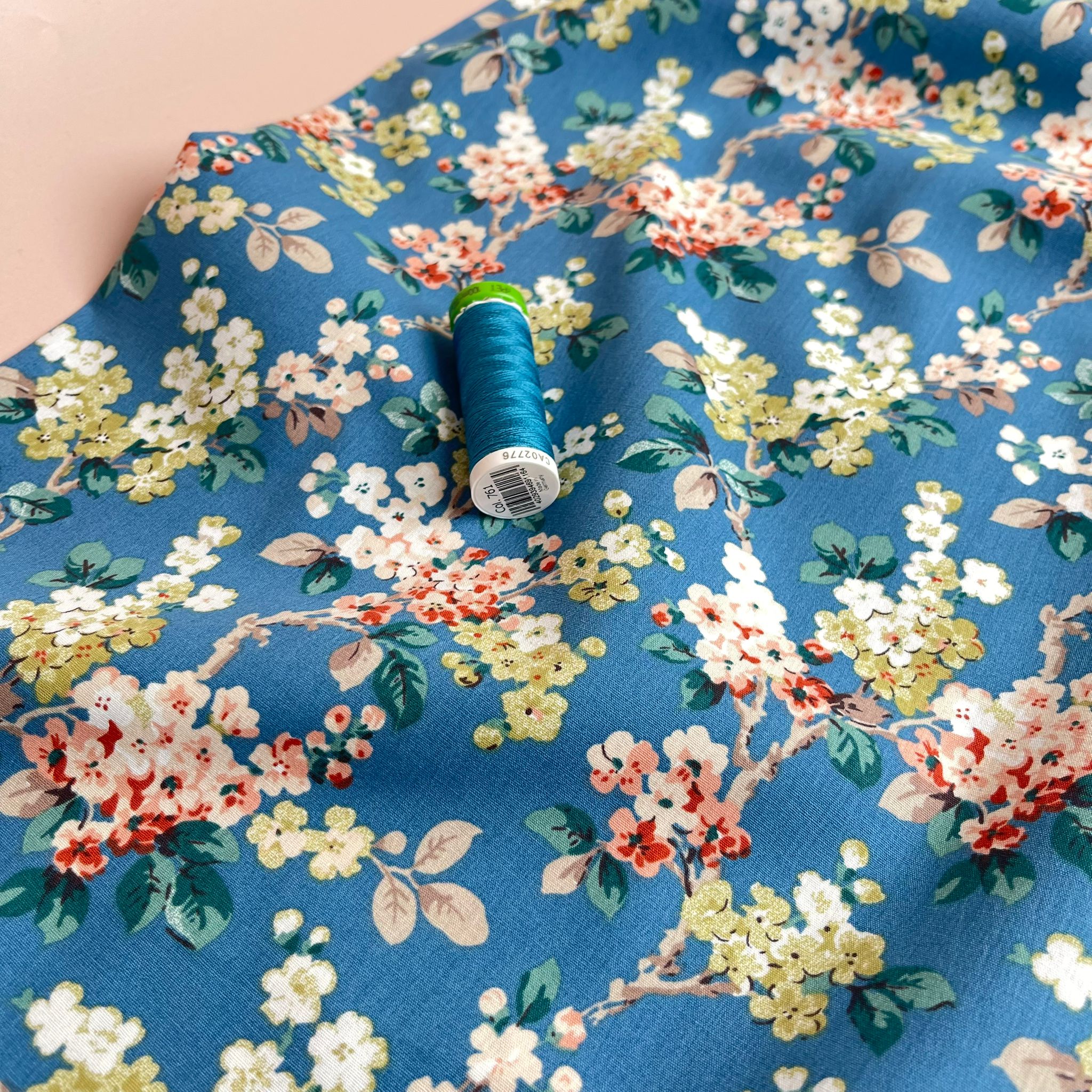 Spring Blossoms on Blue Cotton Poplin