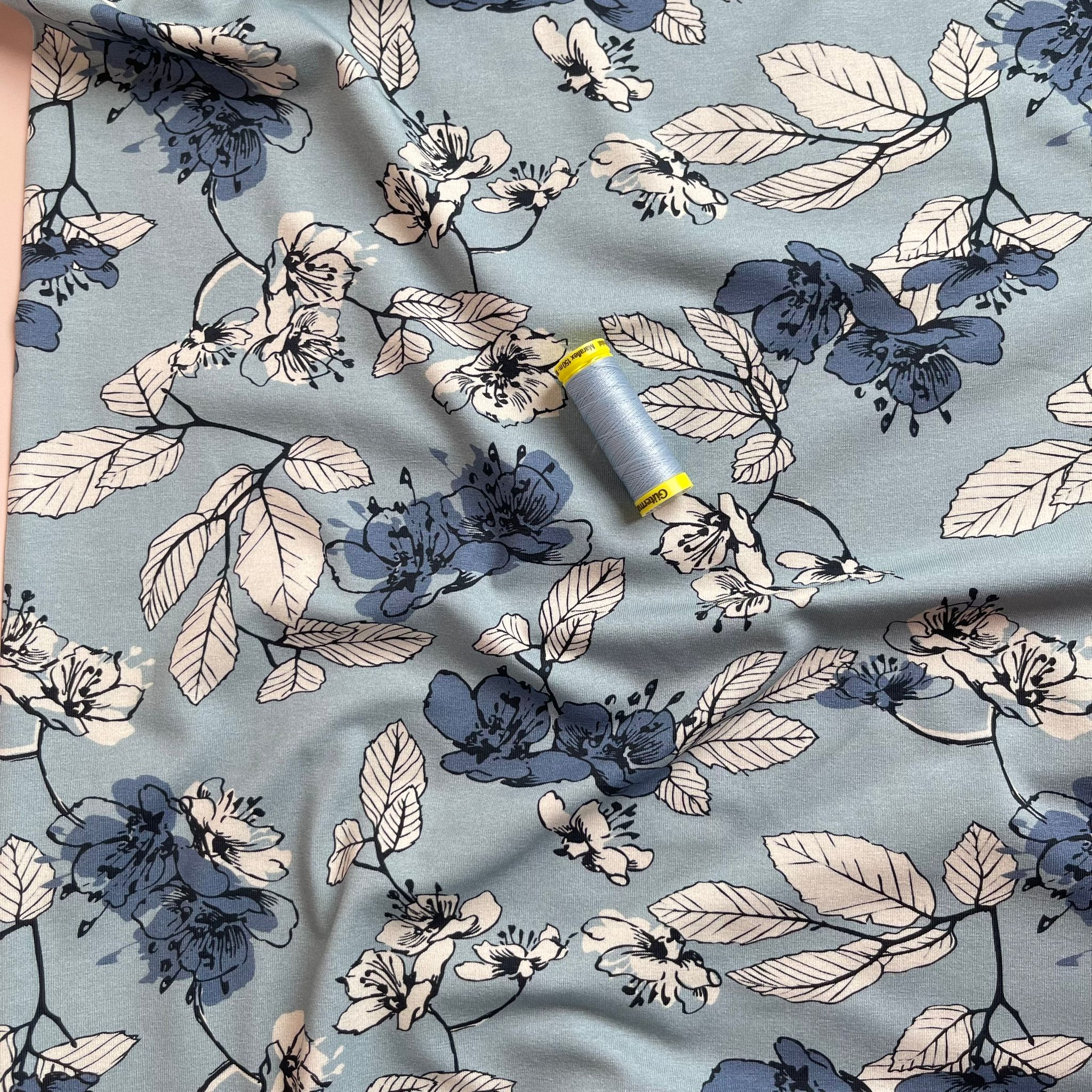 Danish Design - Elegant Florals on Pale Blue Cotton Jersey Fabric