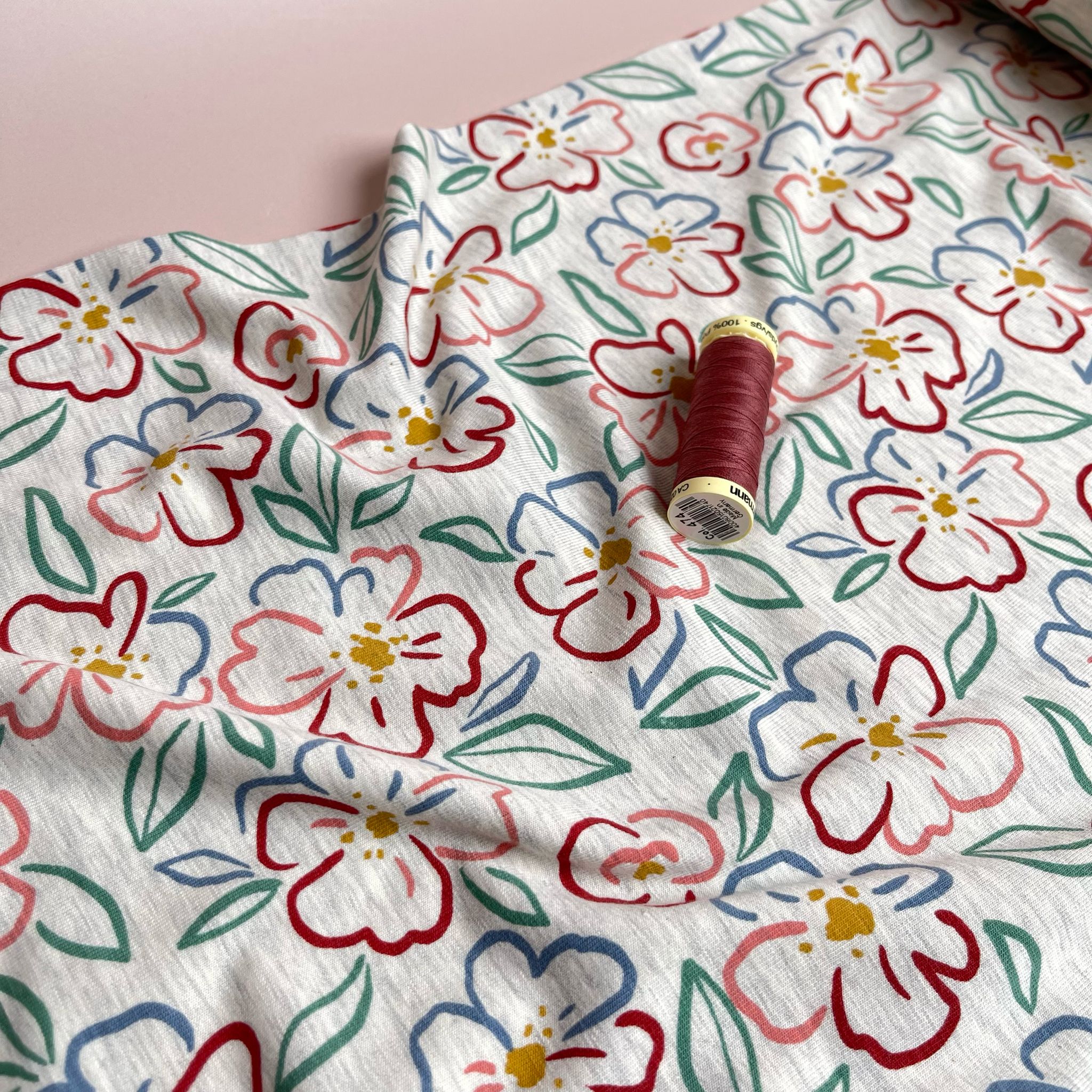 Floral Outline on Ecru Melange Jersey Fabric