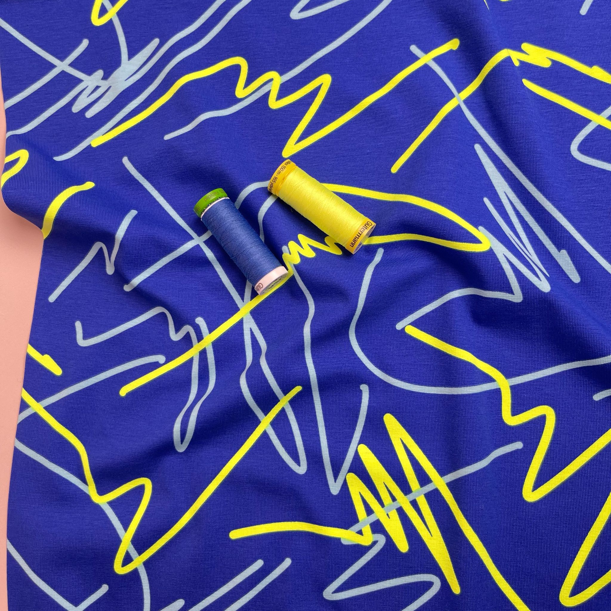 REMNANT 0.4 Metre - Neon Doodles on Blue Cotton Jersey Fabric