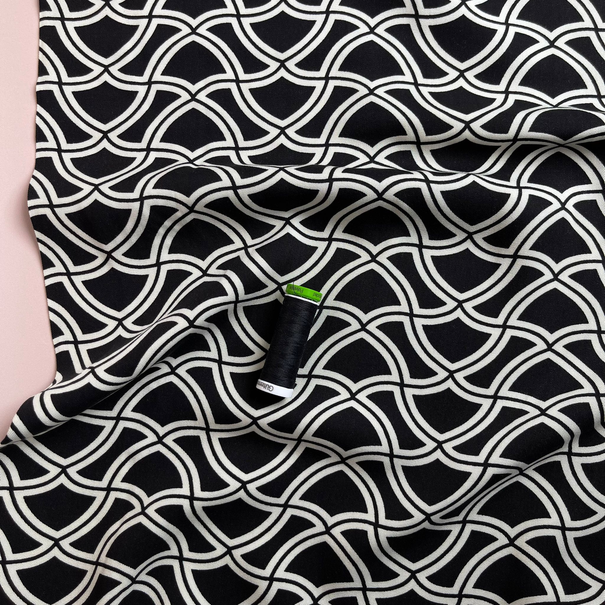 Abstract Waves on Black Viscose Twill Fabric