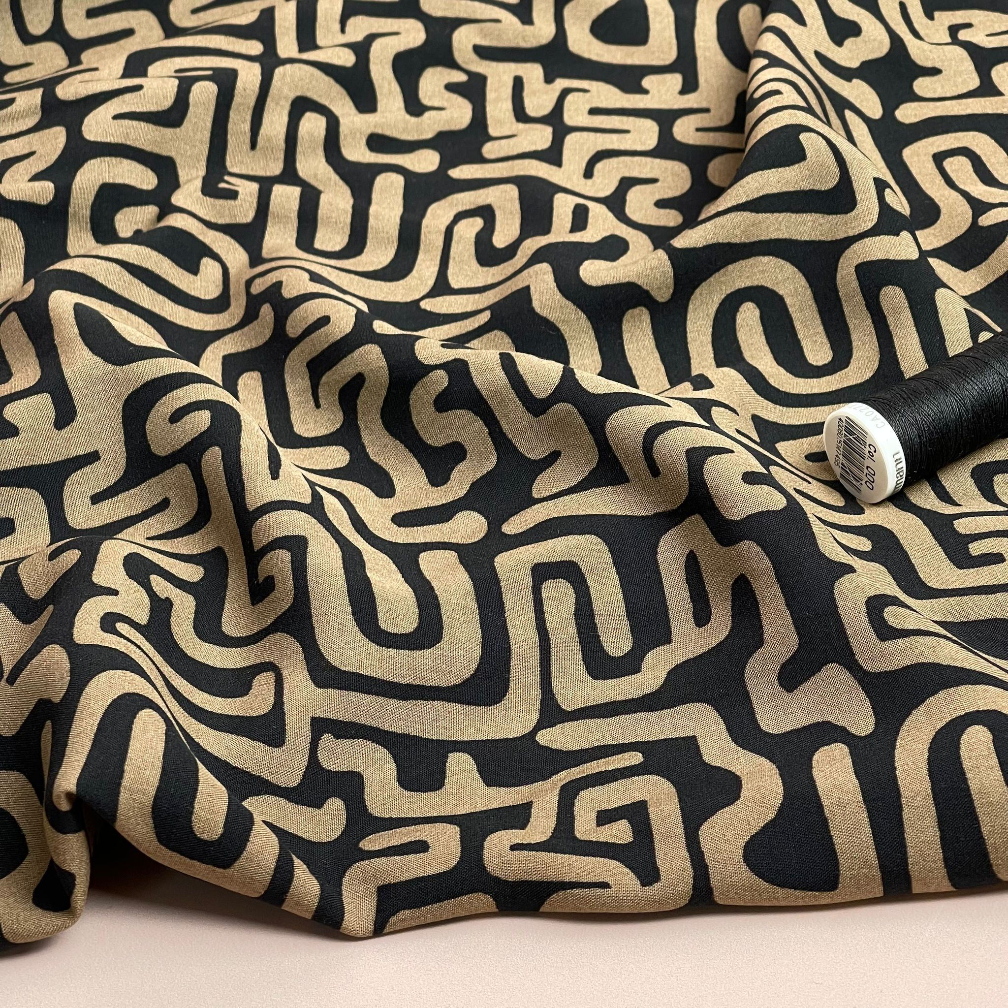 Maze on Black Viscose Poplin Fabric