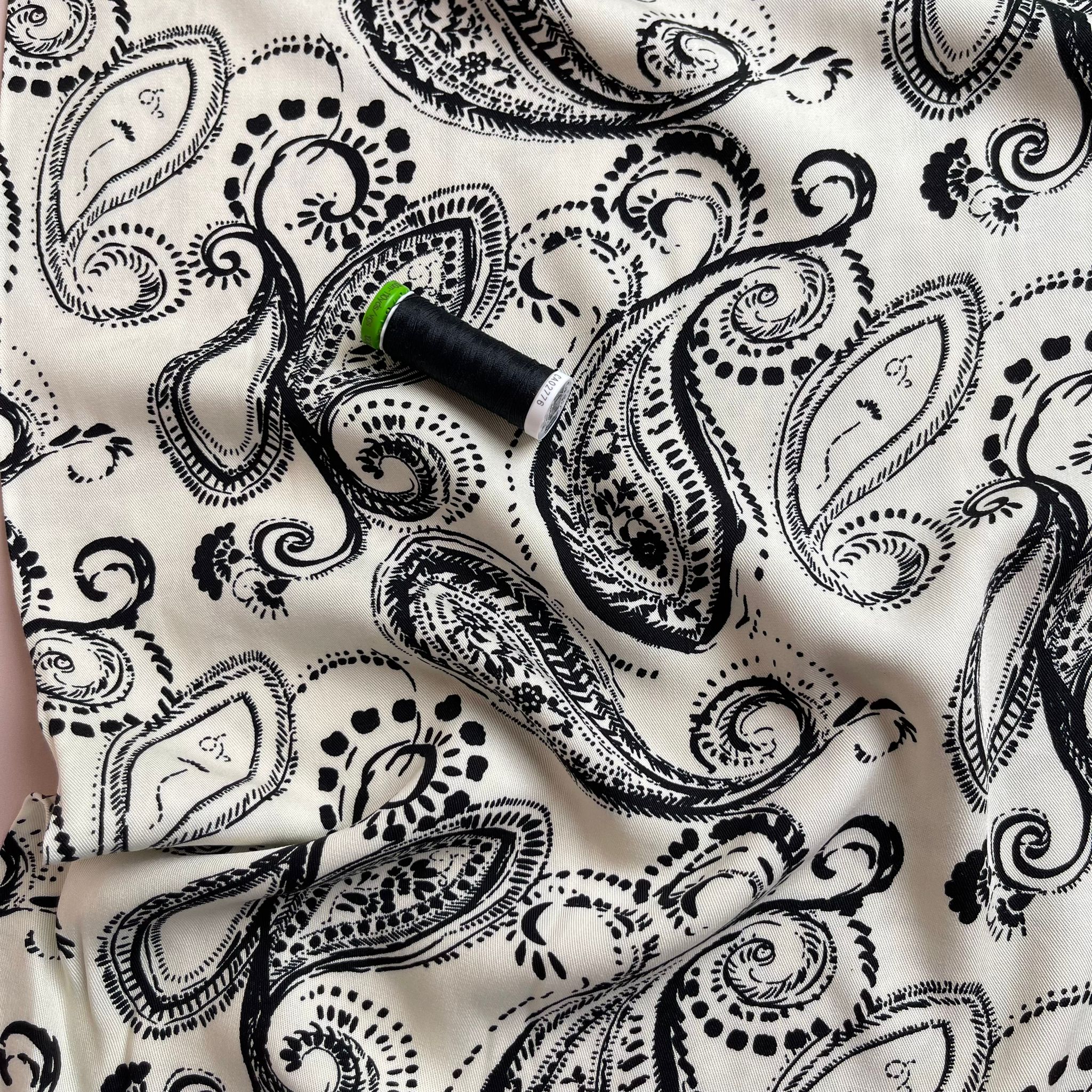 Black Paisley on Off-White Viscose Twill Fabric