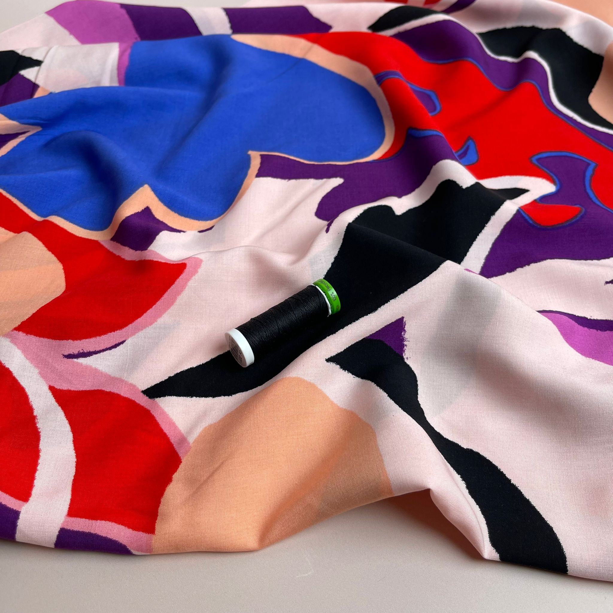 Bold Abstract Blooms on Purple Viscose Fabric