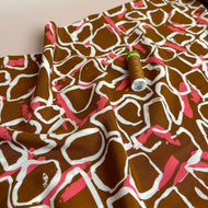 White Shapes on Brown Viscose Fabric