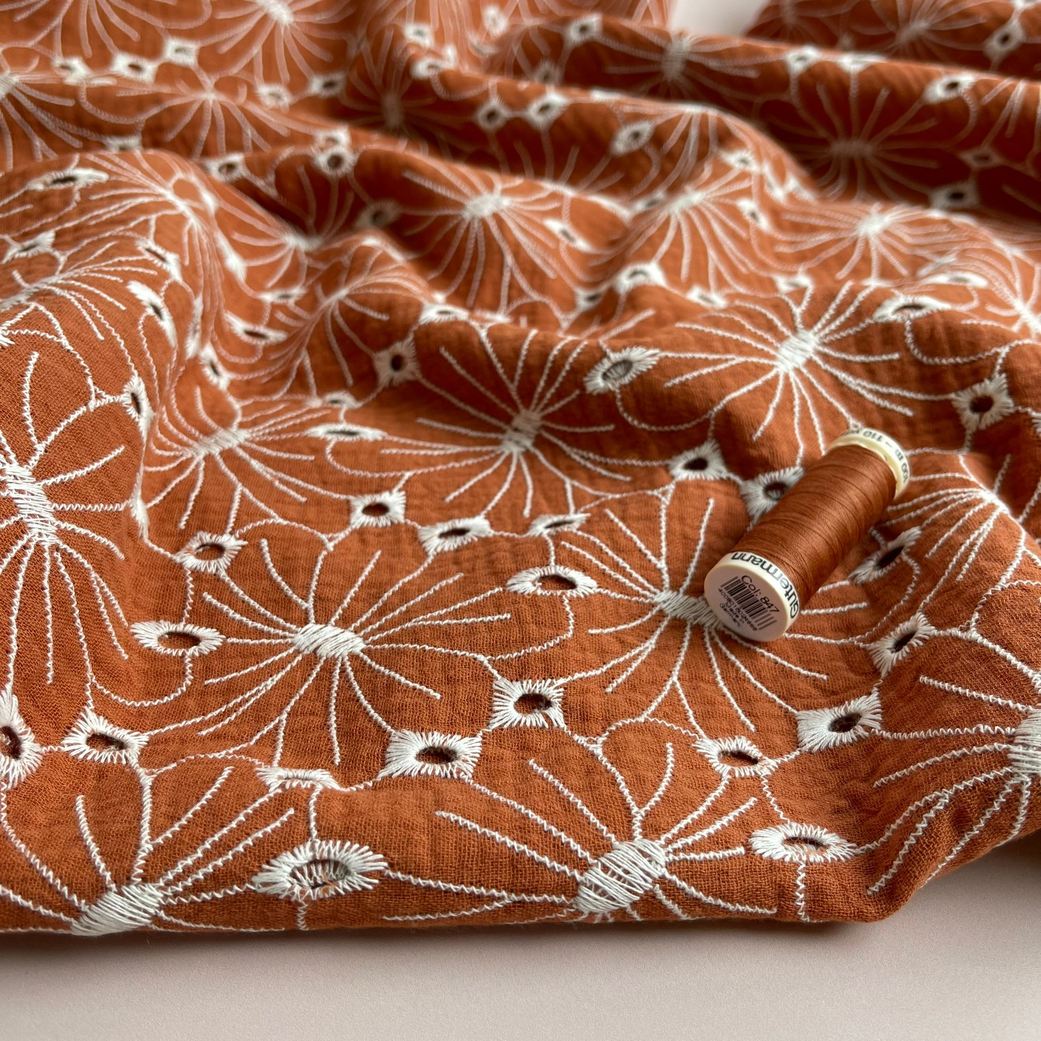 REMNANT 0.6 Metre - Embroidered Flowers on Rust Cotton Double Gauze