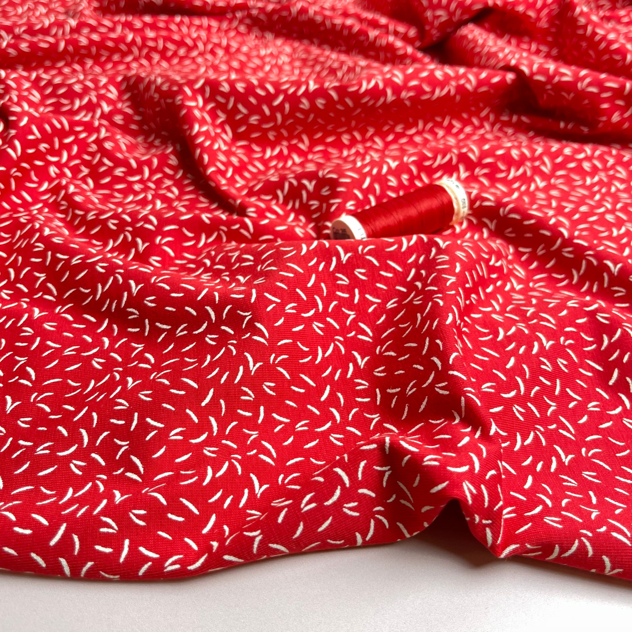 Dashes on Red Cotton Jersey Fabric