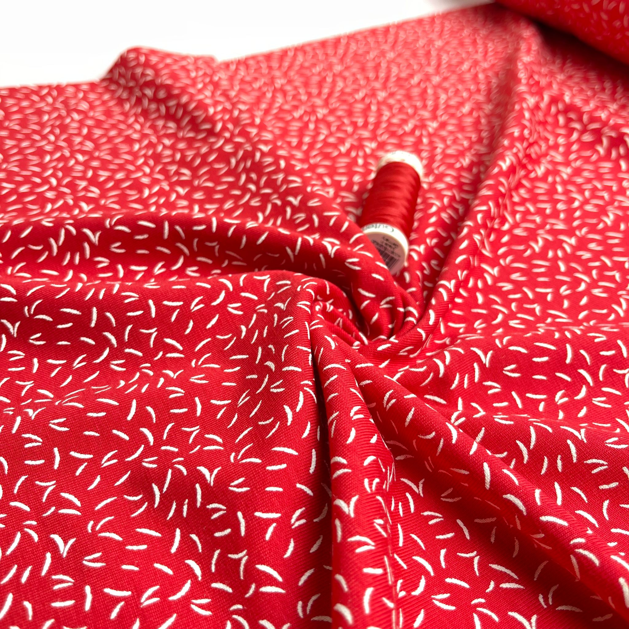 Dashes on Red Cotton Jersey Fabric