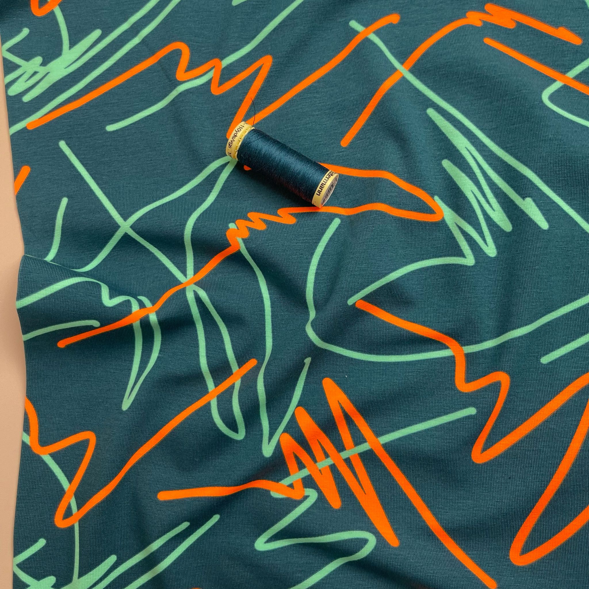 Neon Doodles on Dark Teal Cotton Jersey Fabric