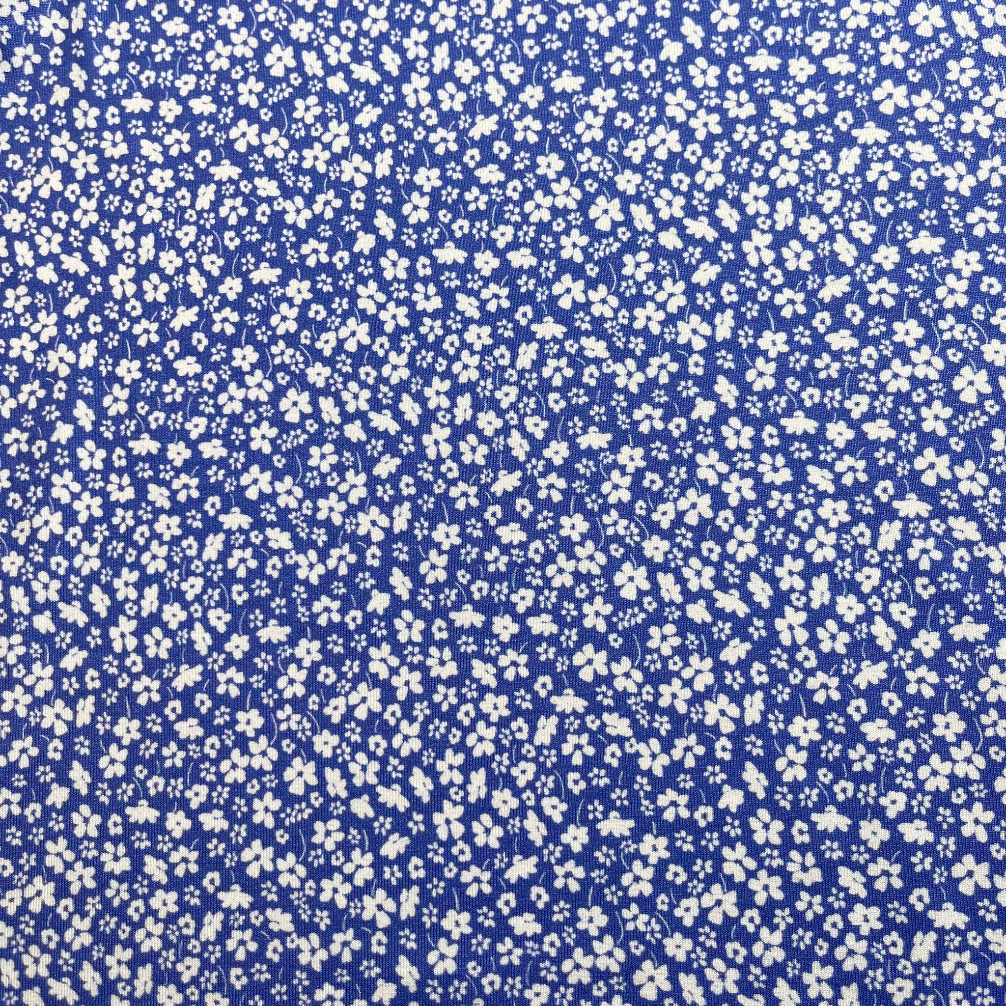 Ex-Designer Deadstock White Flowers on Blue Viscose Jersey Fabric