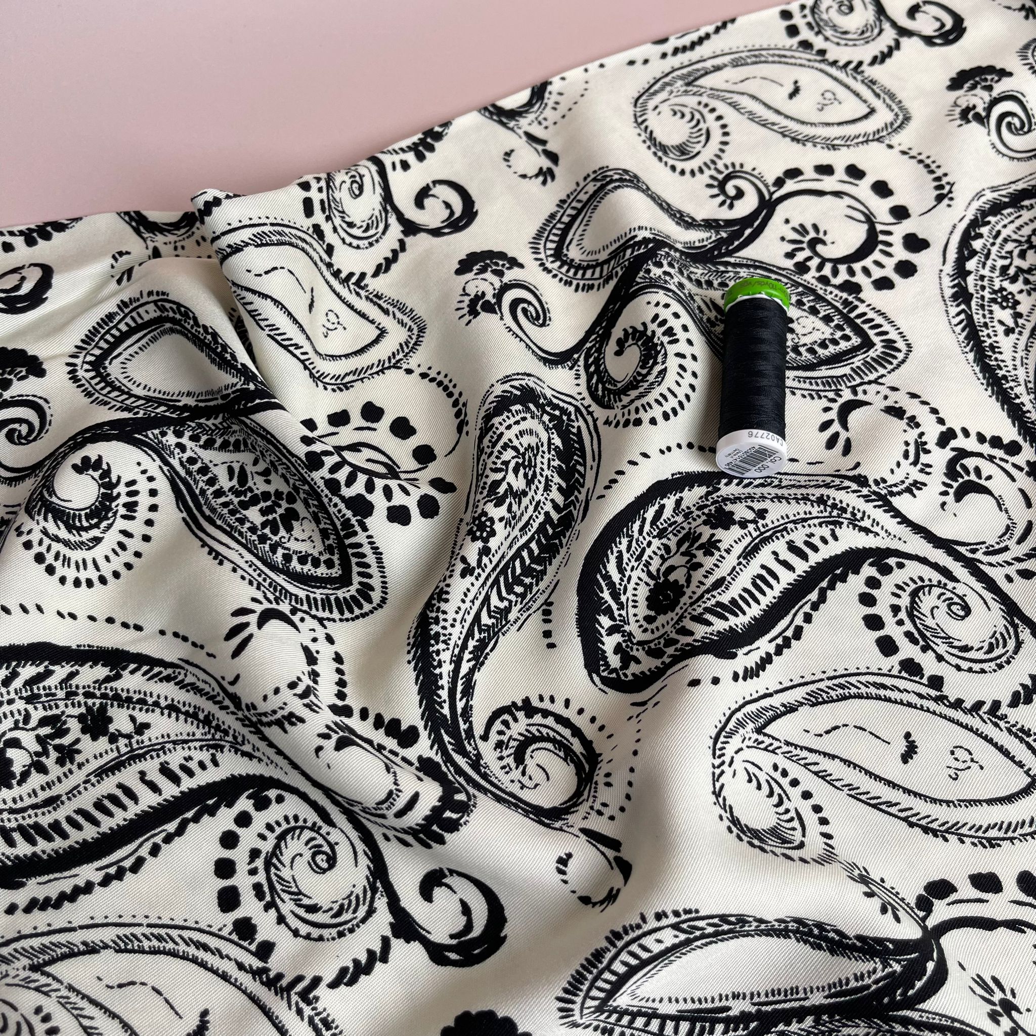 Black Paisley on Off-White Viscose Twill Fabric