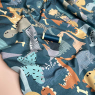 REMNANT 1.34 Metres - Danish Design - Dino Party Cotton Jersey Fabric