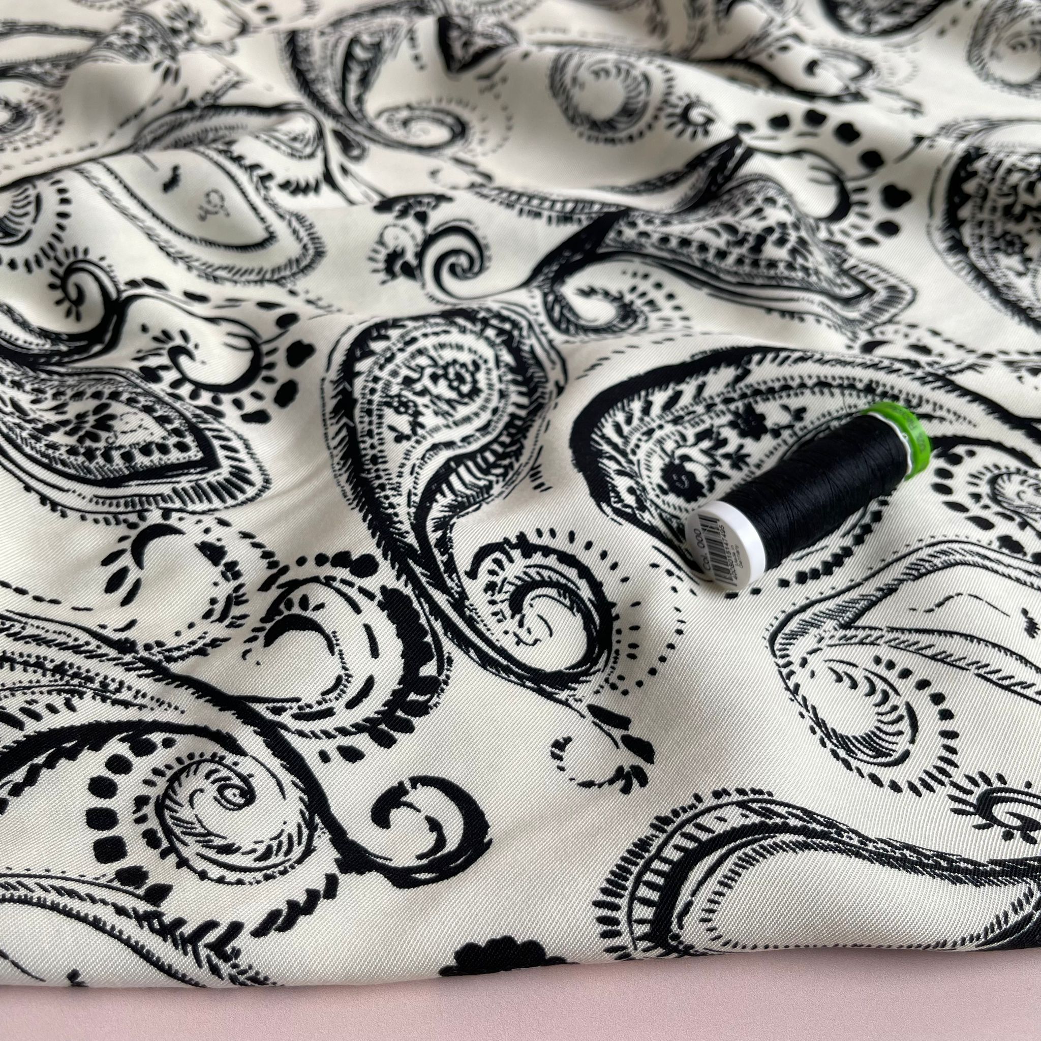 Black Paisley on Off-White Viscose Twill Fabric