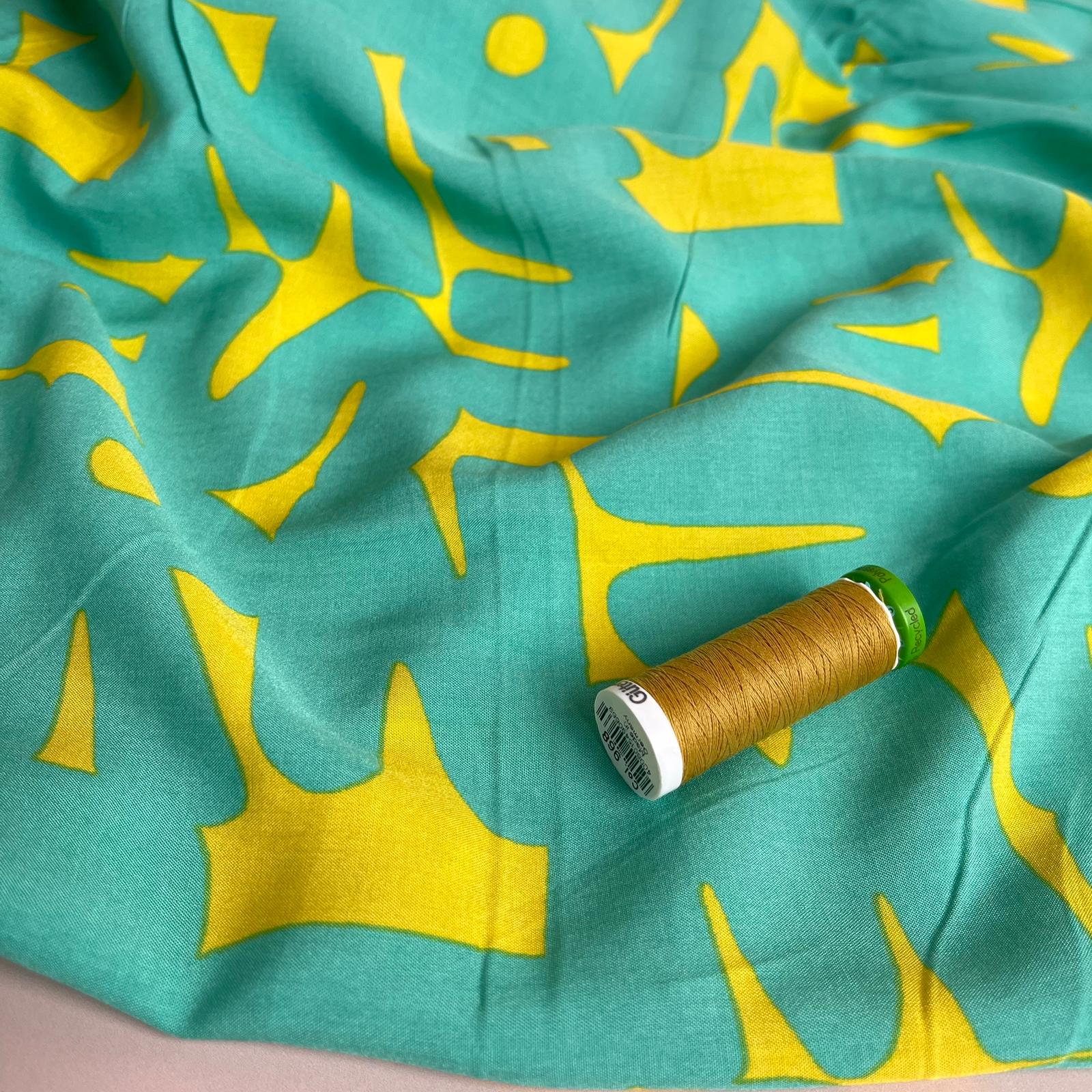 Turquoise Alphabet Viscose Poplin Fabric