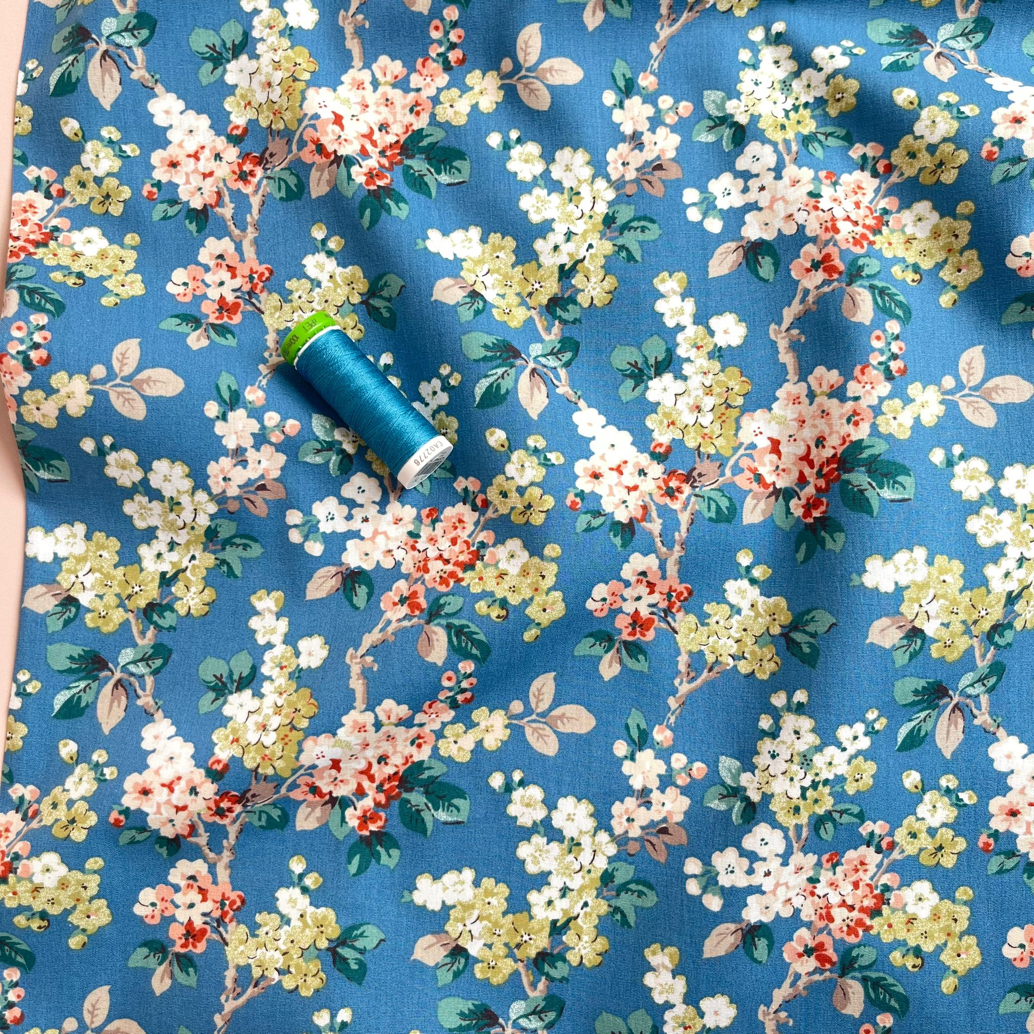 Spring Blossoms on Blue Cotton Poplin