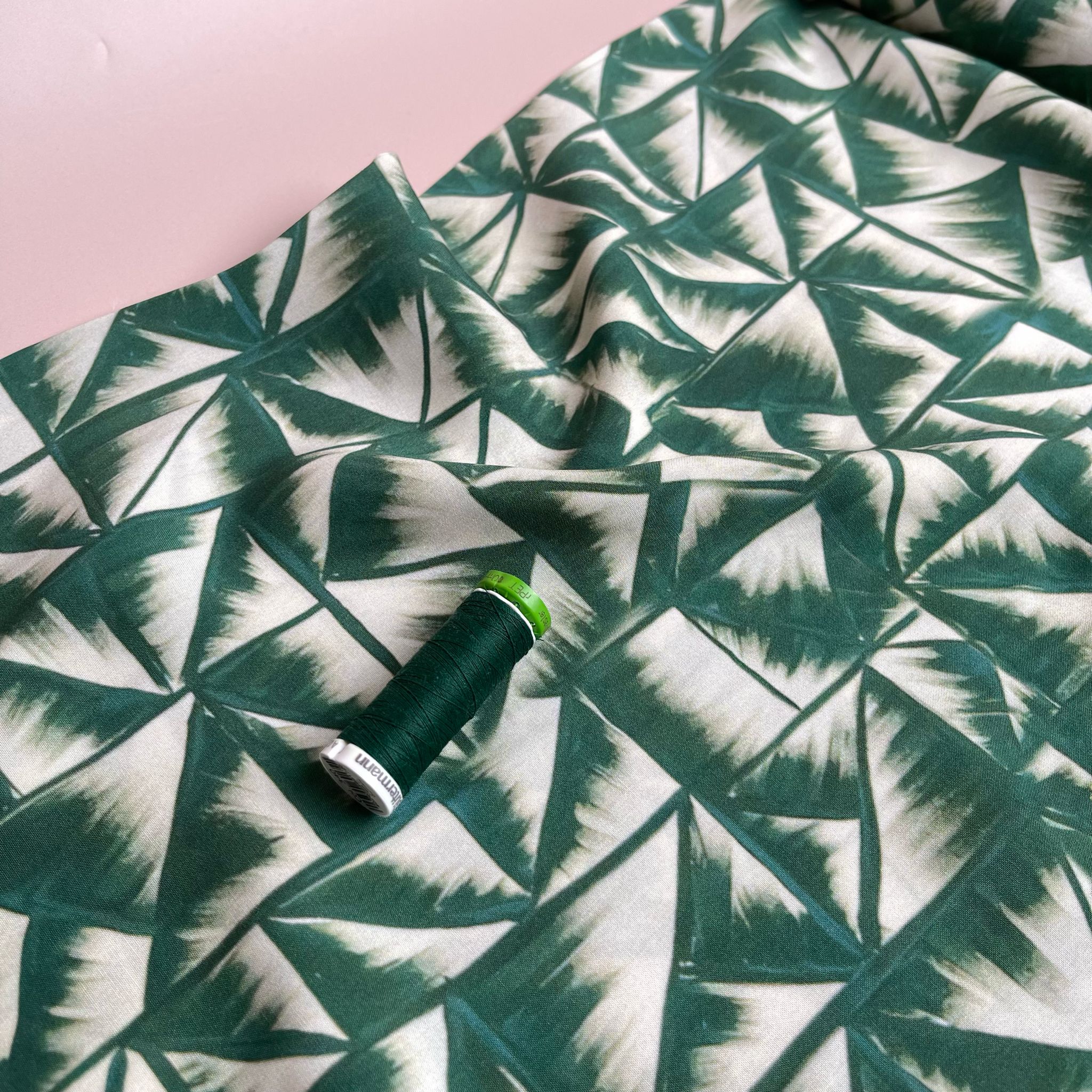 Smudged Triangles in Green Viscose Fabric