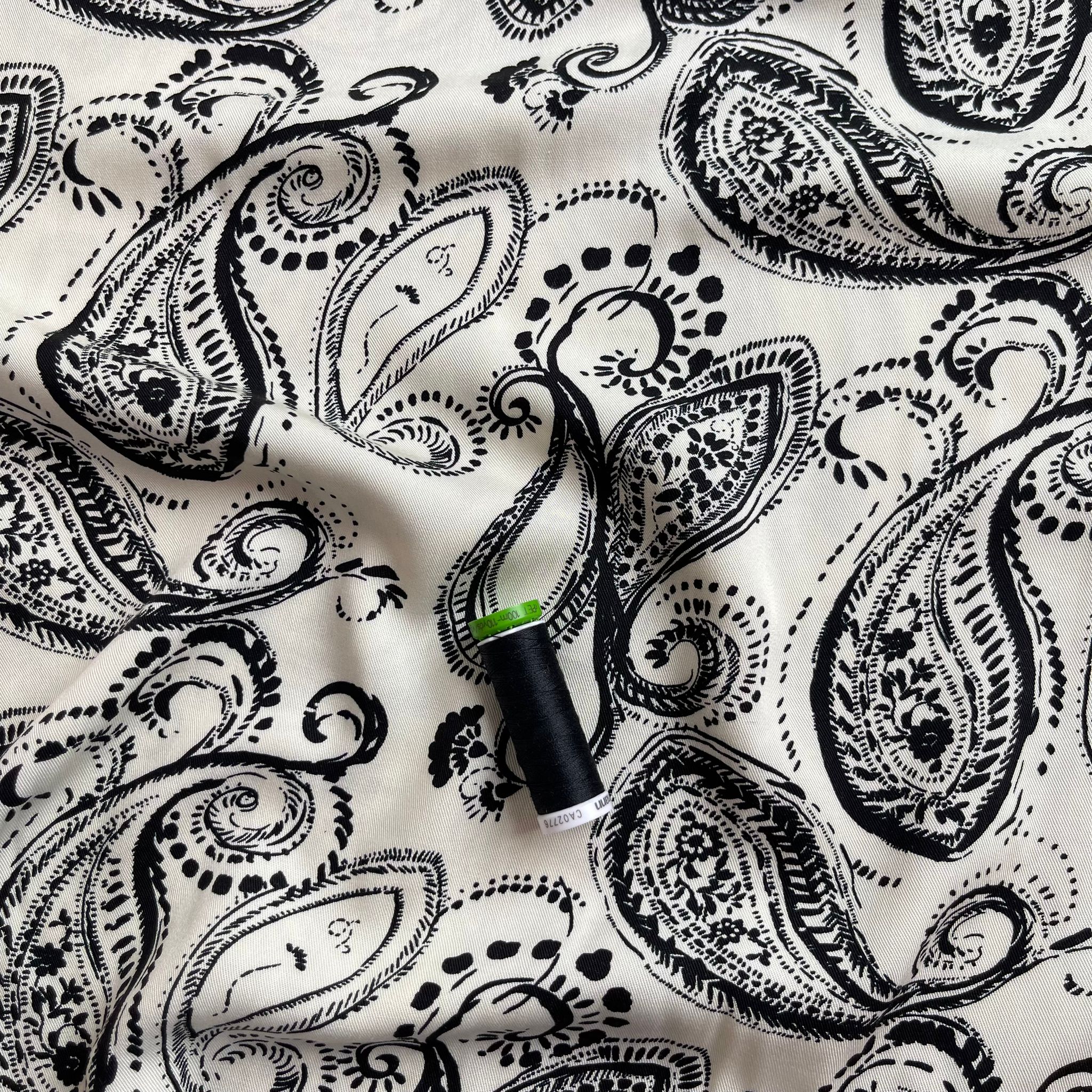 Black Paisley on Off-White Viscose Twill Fabric