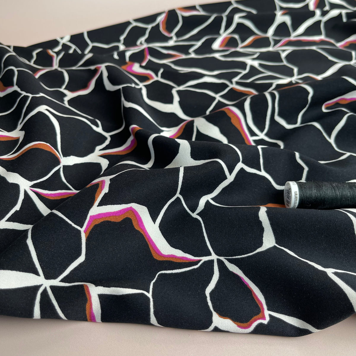 Rosella Line Flowers in Black Stretch Viscose Twill Fabric – Lamazi Fabrics