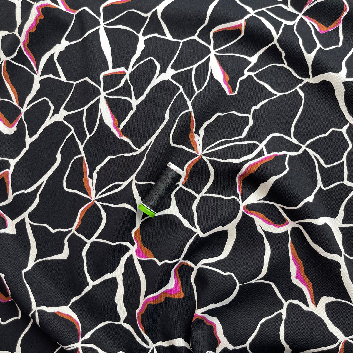 Rosella Line Flowers in Black Stretch Viscose Twill Fabric – Lamazi Fabrics