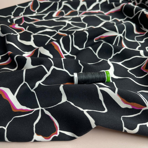 REMNANT 0.7 Metre -  Rosella Line Flowers in Black Stretch Viscose Twill Fabric