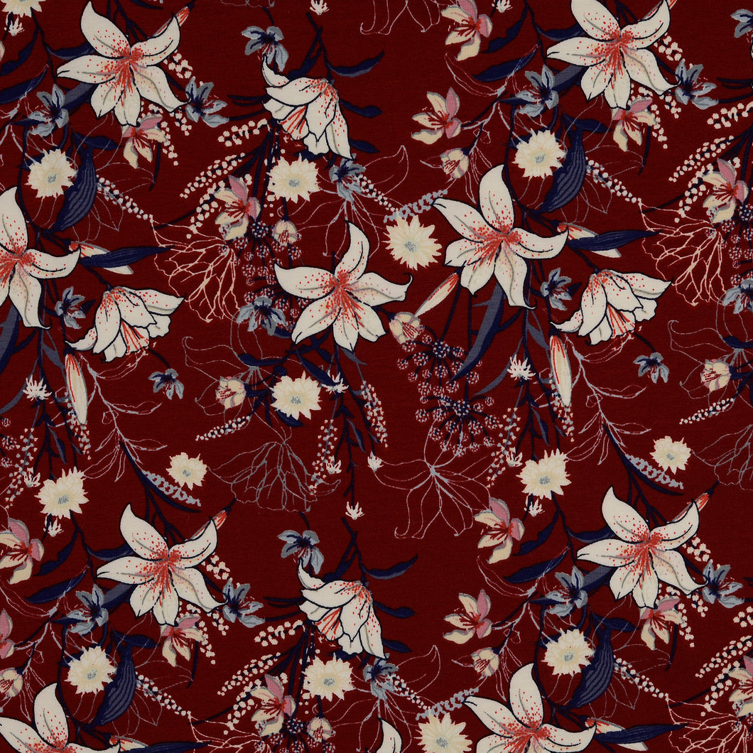 Lilies on Budgundy Cotton Jersey Fabric
