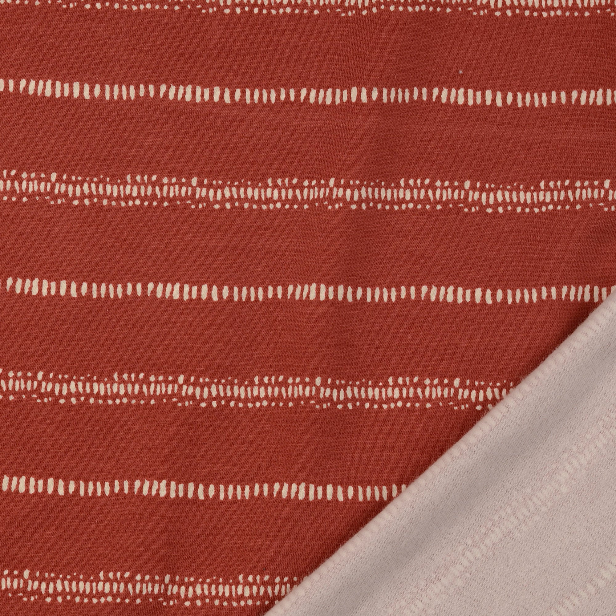 Broken Lines on Tandoori Spice Cotton French Terry Fabric