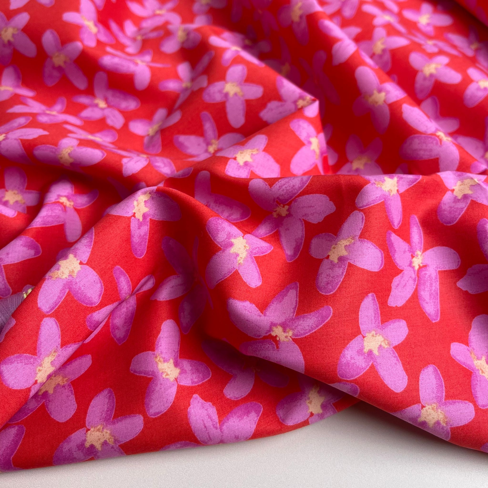 Painted Pink Flowers on Red Cotton Lawn Fabric