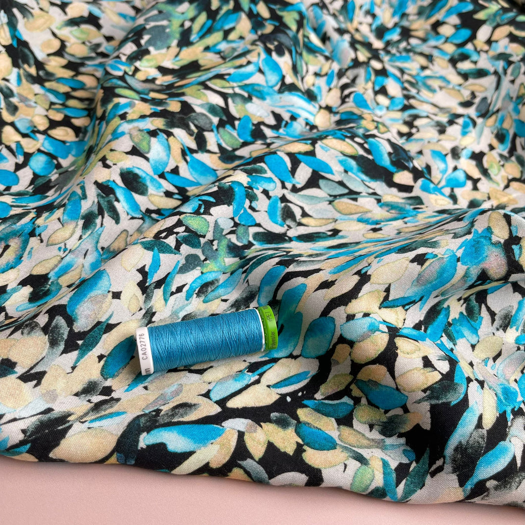 Falling Petals in Turquoise Viscose Fabric