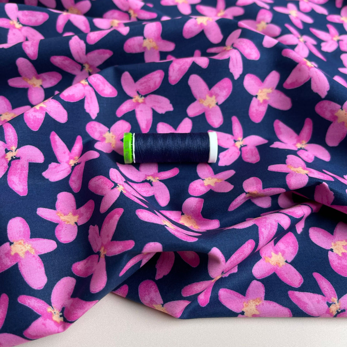 Painted Pink Flowers on Navy Cotton Lawn Fabric Lamazi Fabrics