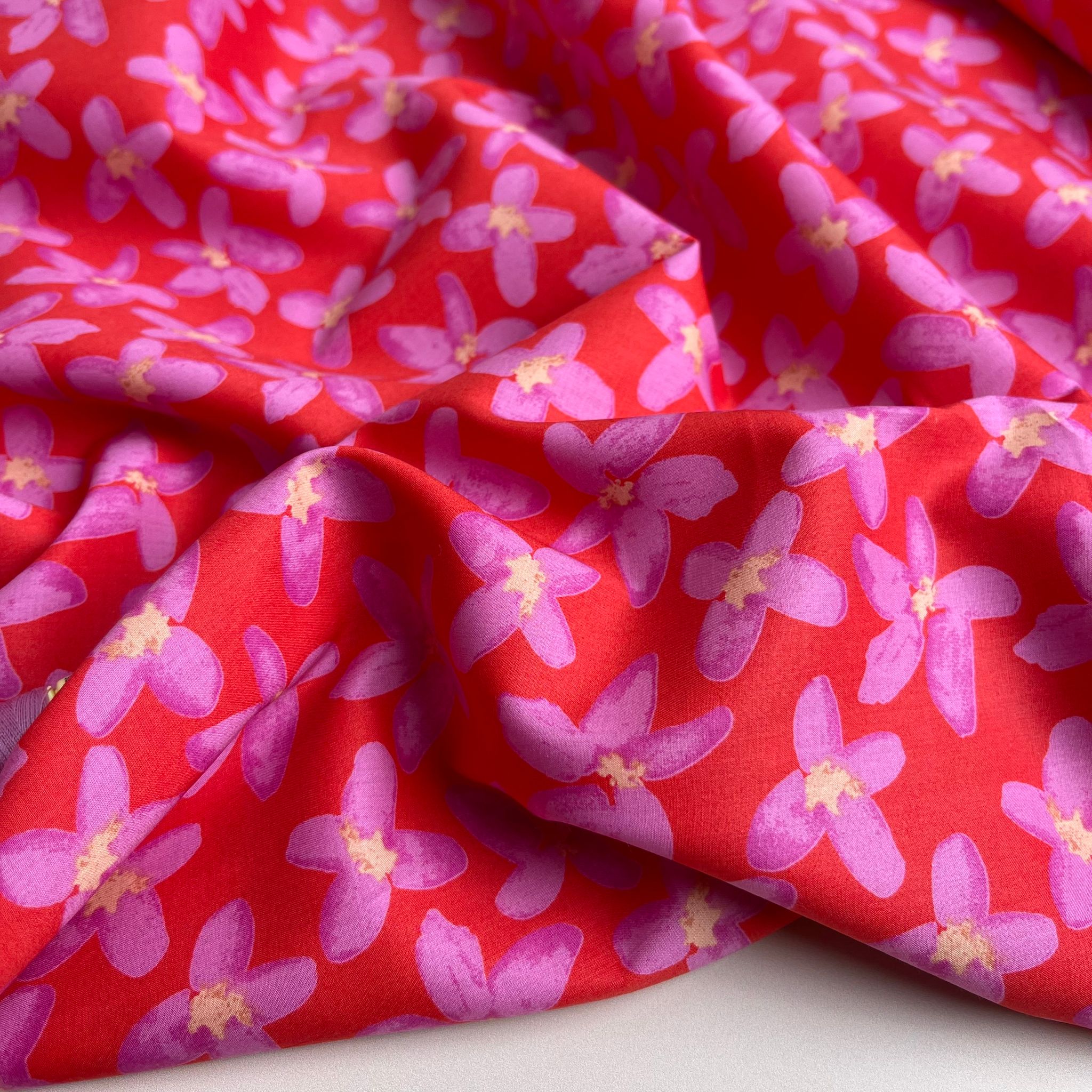 Painted Pink Flowers on Red Cotton Lawn Fabric