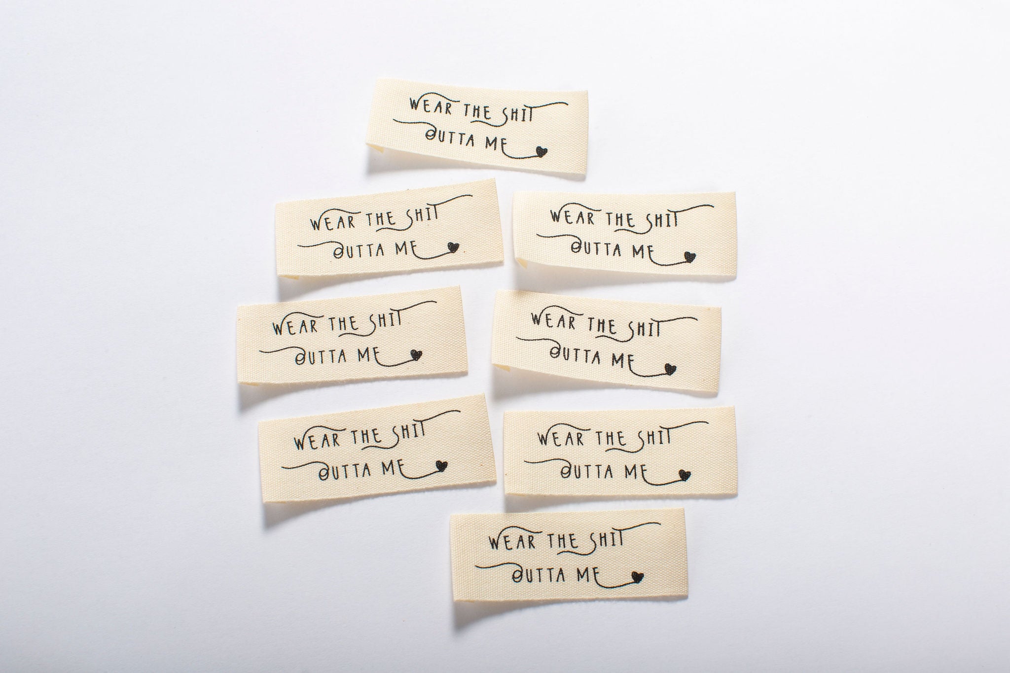 Kylie and the Machine - "WEAR THE SH*T OUTTA ME" Cotton Labels 8 Pack