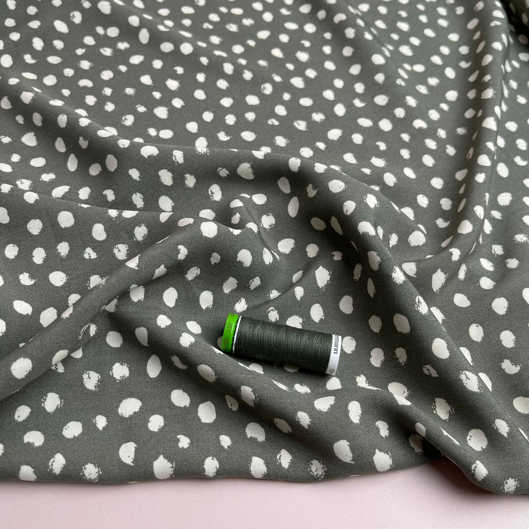 Abstract Dots on Green Viscose Fabric