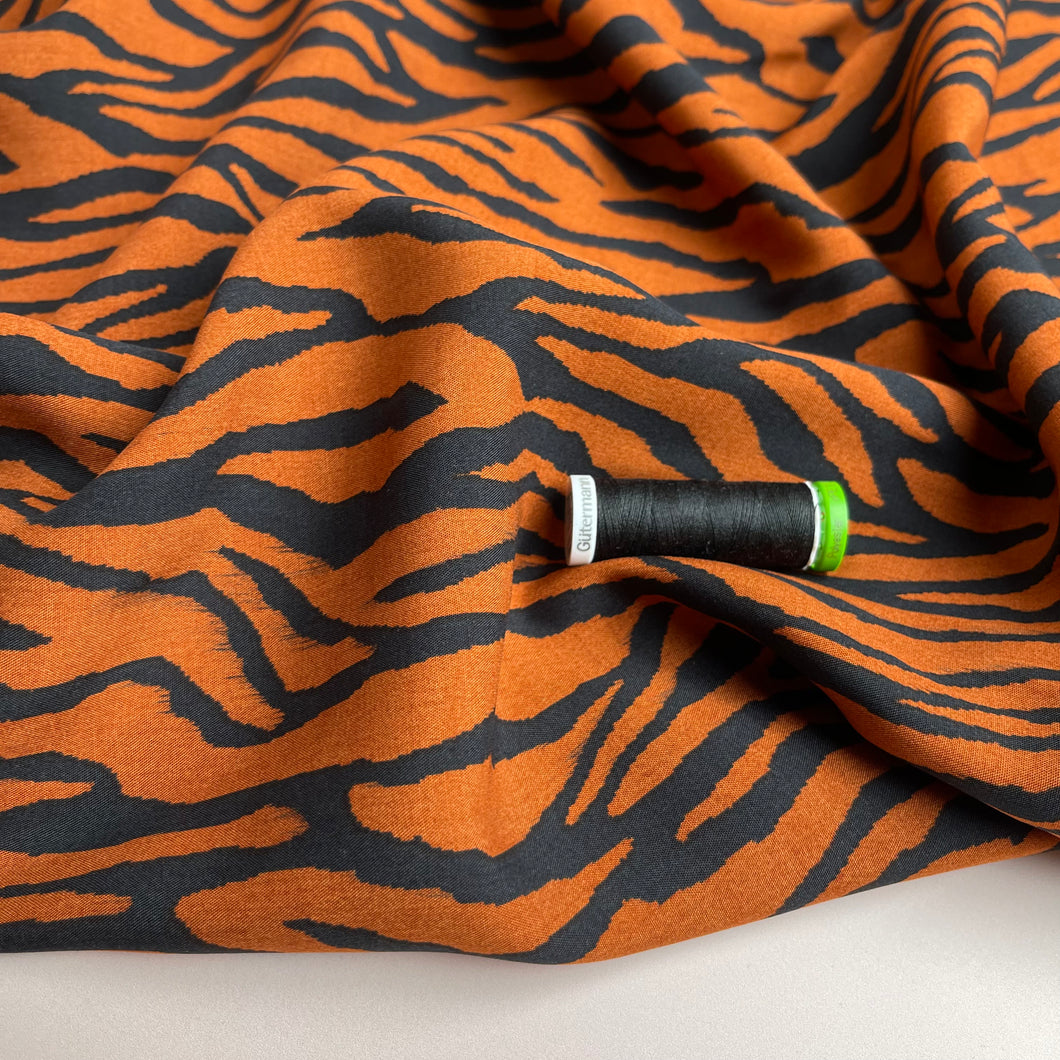 REMNANT 0.45 Metre - Zebra Rust and Black Viscose Fabric
